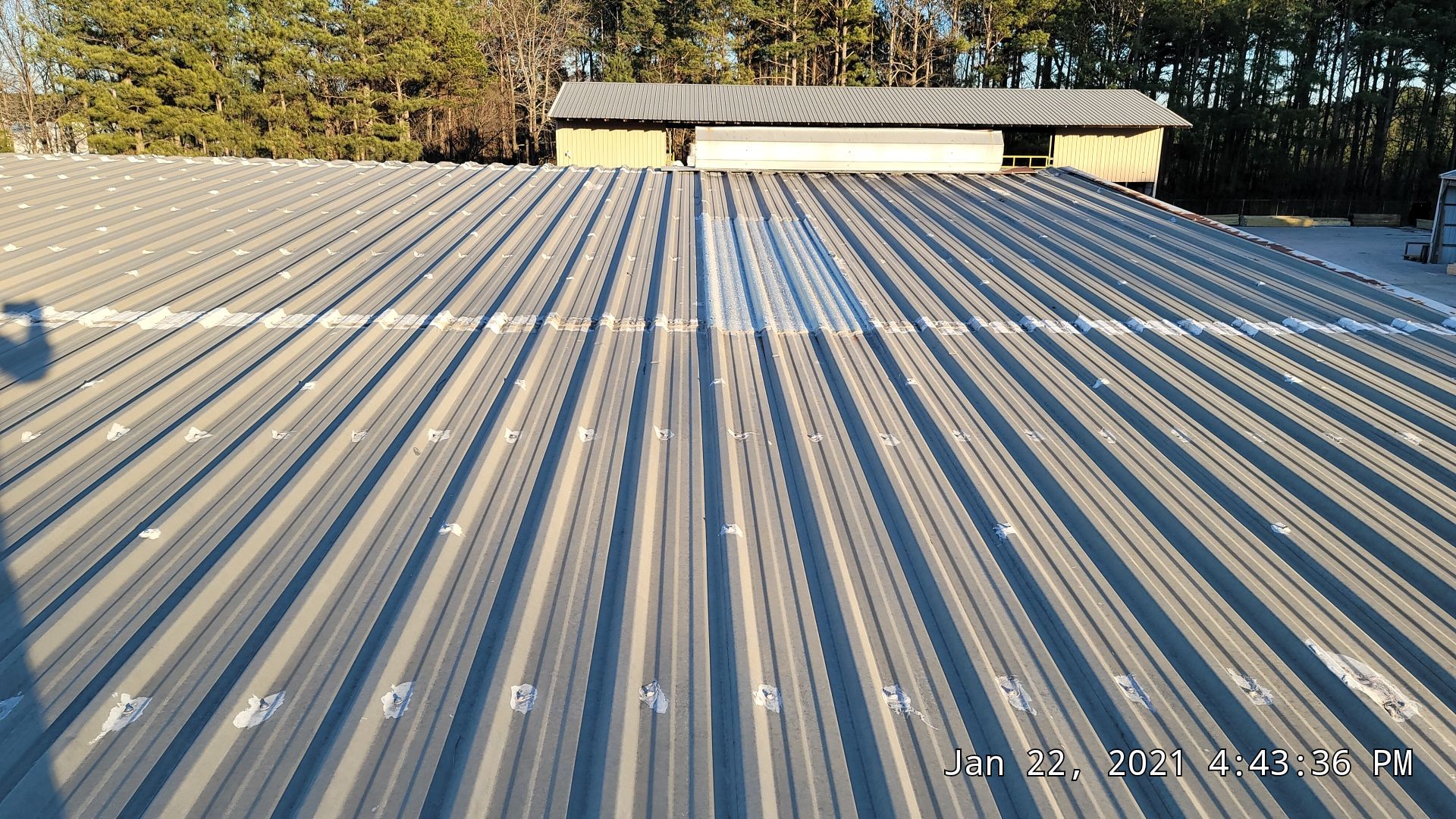 Commercial Roofing Installation using Aldocoat Coatings by Hostetler Roofing