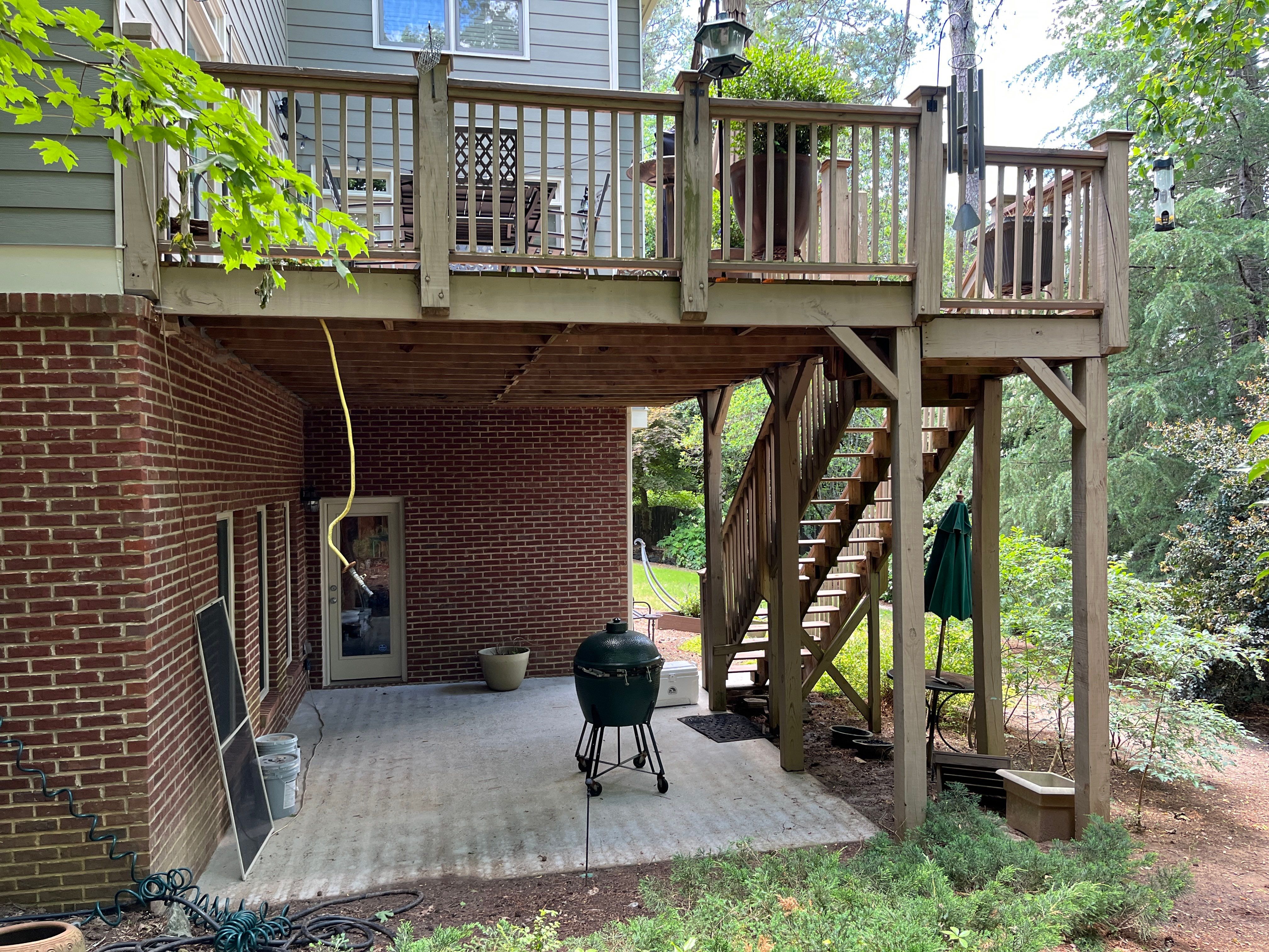 Tucker, GA Covered Porch Build and Deck Replacement using Deckorators Voyage Series Decking by Nelson Exteriors 