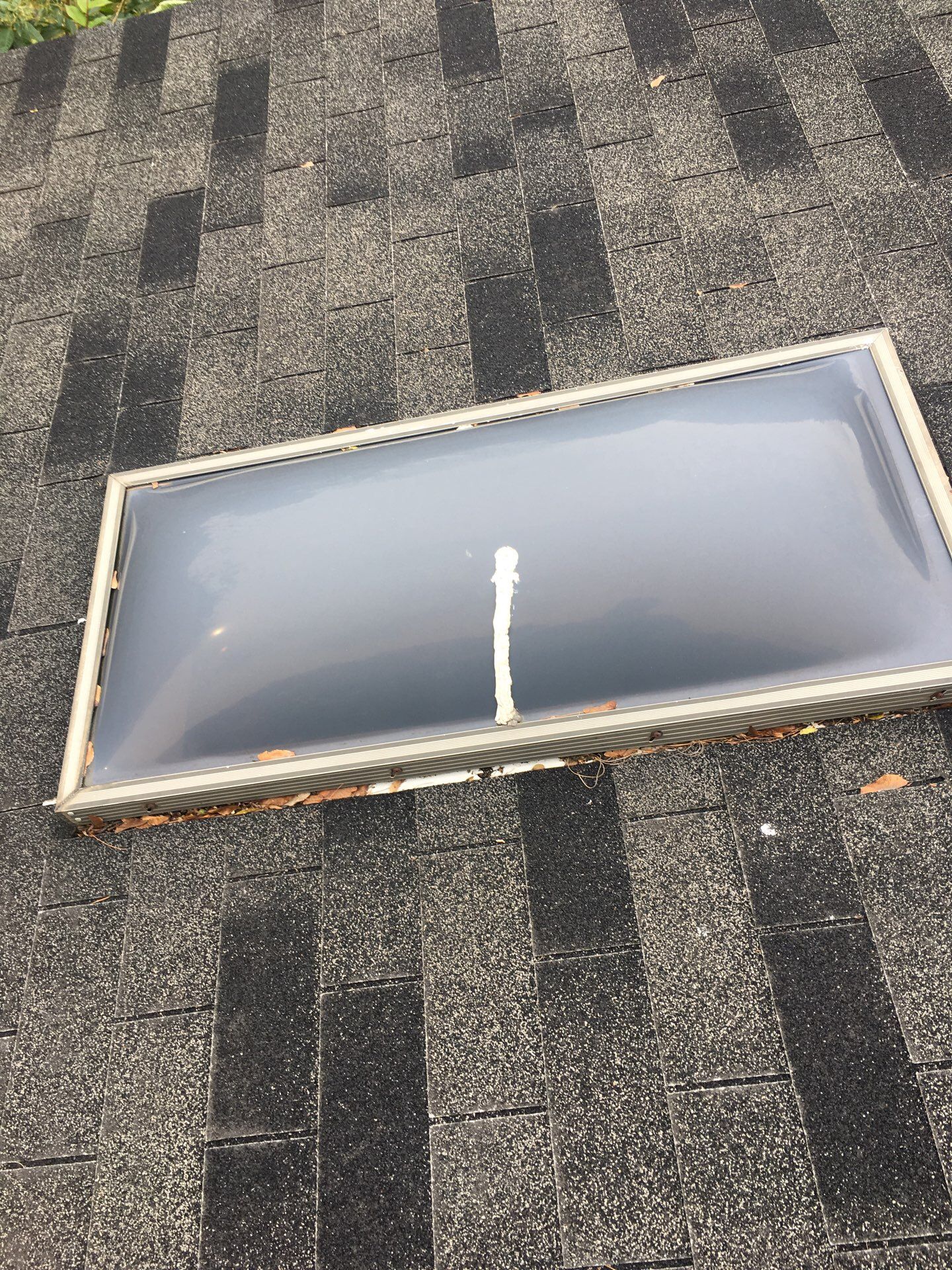 Roof and Skylight Replacement by American Home Contractors