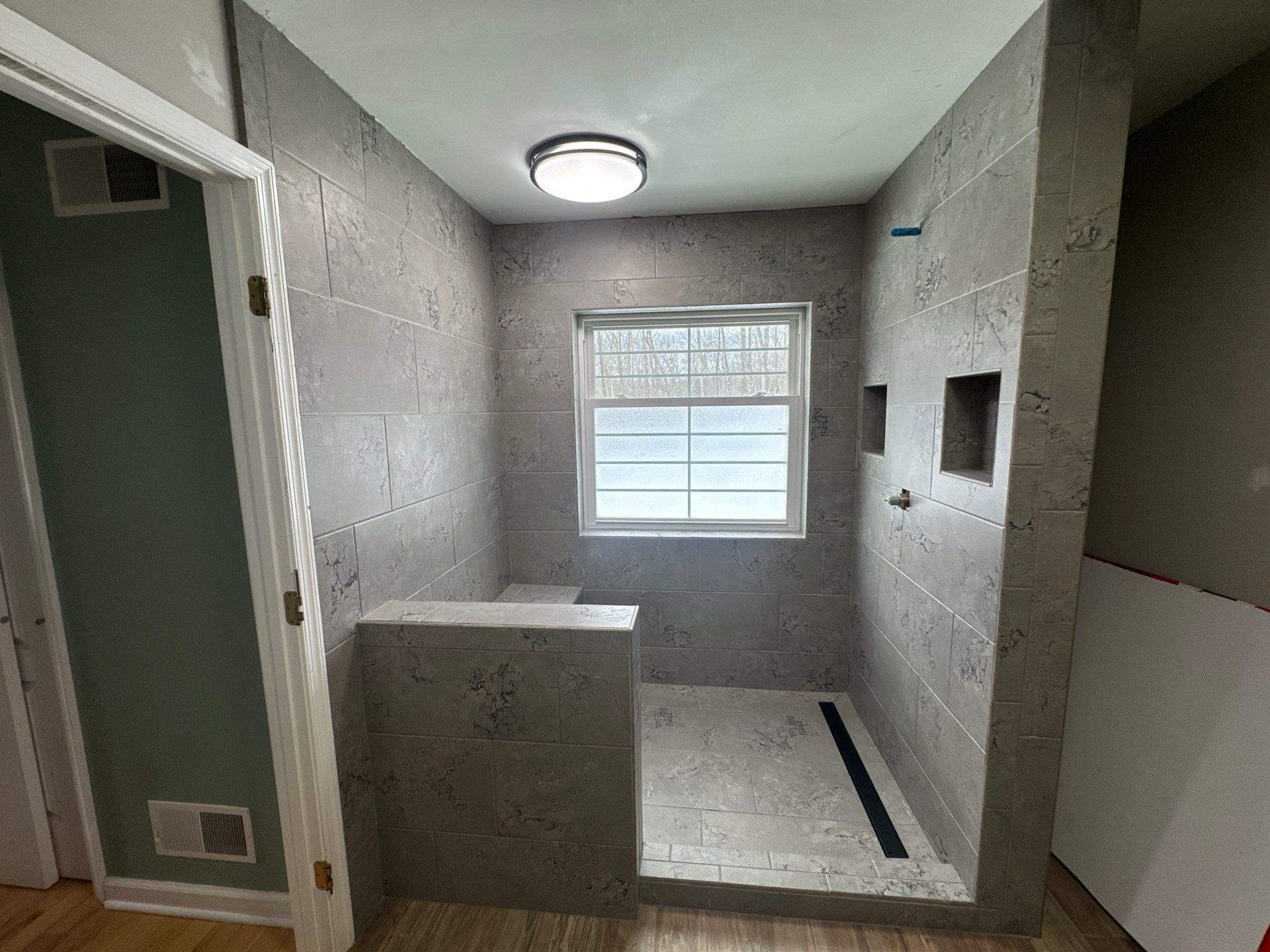 Burns/Olsen Shower Remodel by Integrity Tile and Home LLC