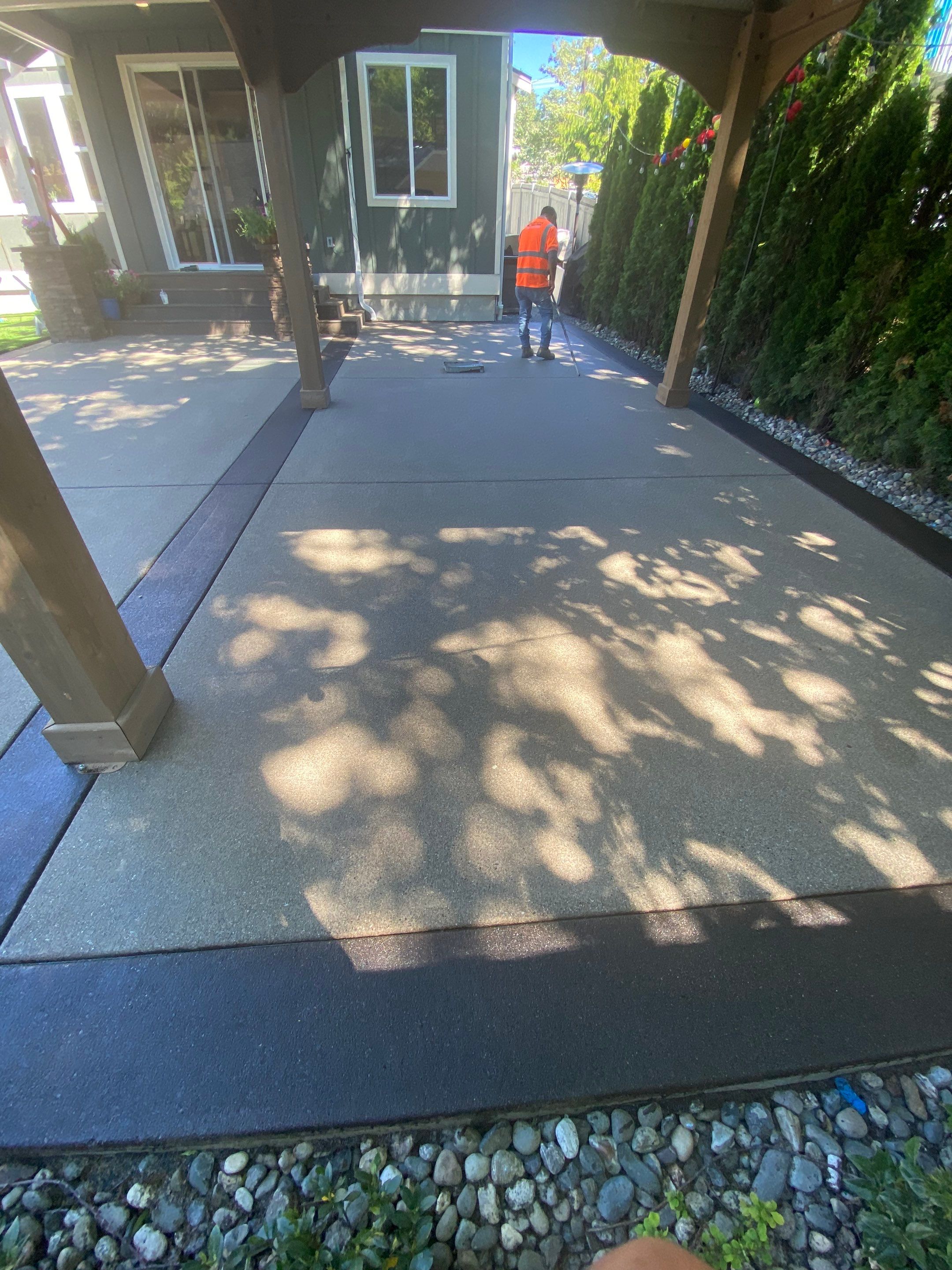 Patio Installation using Concrete, Retaining walls, and Turf install by Jireh Asphalt & Concrete Inc 