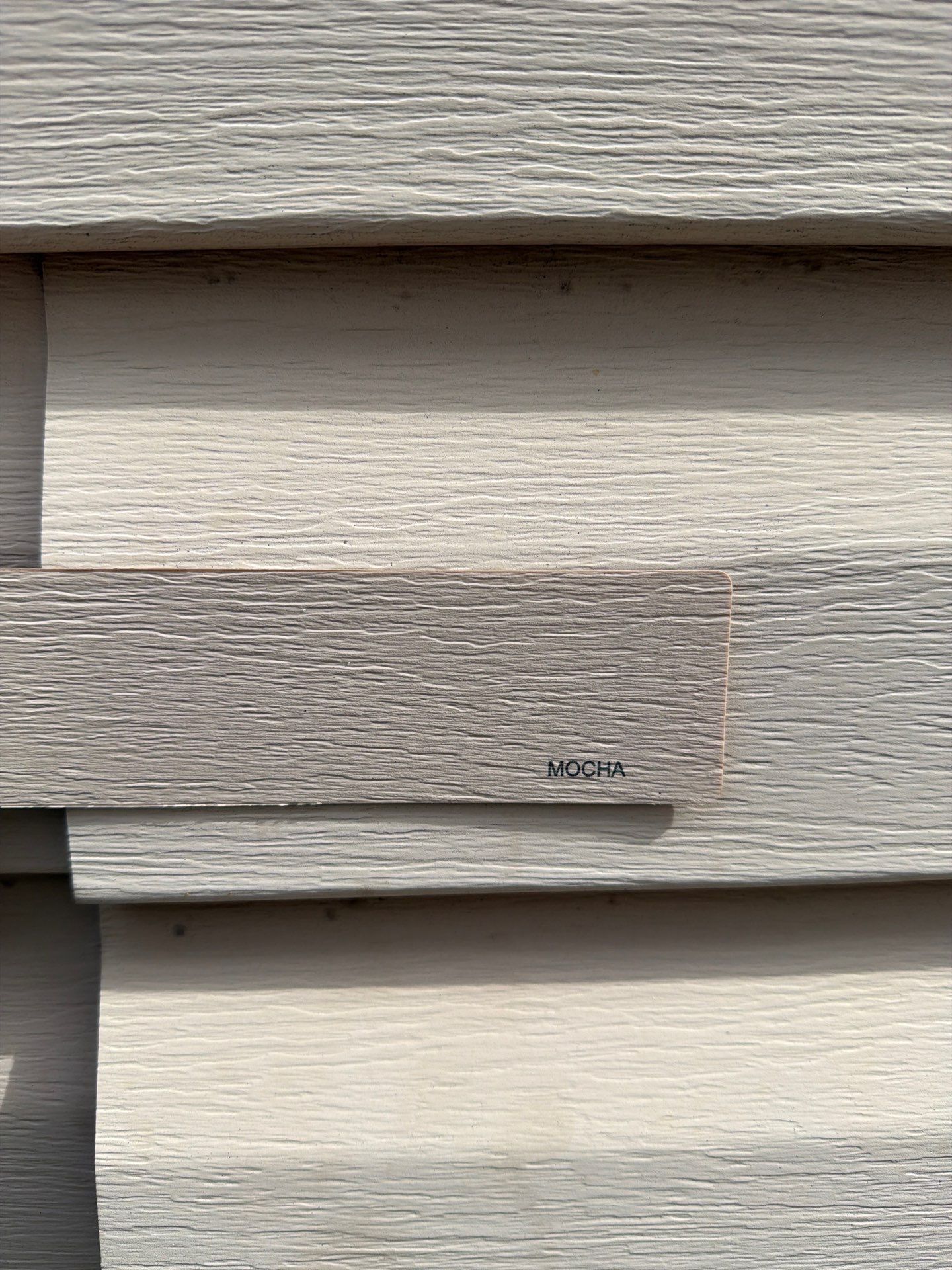 Mocha Lap Siding Installation for St. Louis Residential Exterior by Acute Roofing And Exteriors