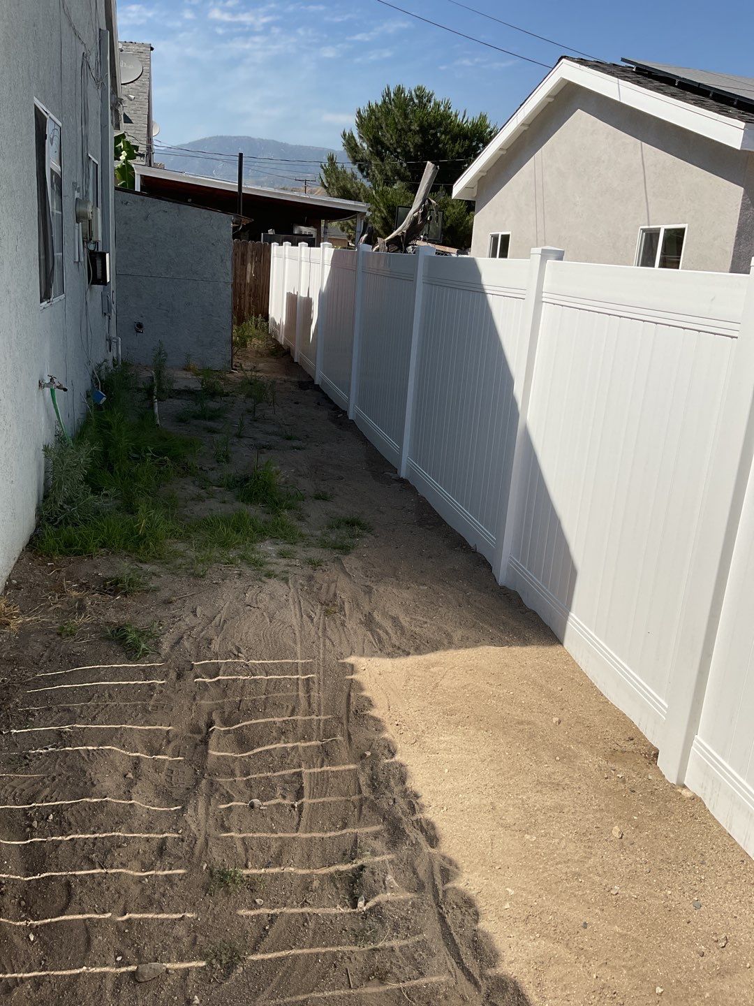 Fence installation using 6ft and 4ft vinyl  by Fence Guys Inc. 