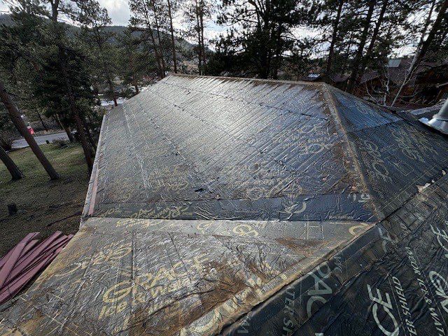 Residential Roofing Installation using Standing Seam Metal by Blue Peaks Roofing LLC 