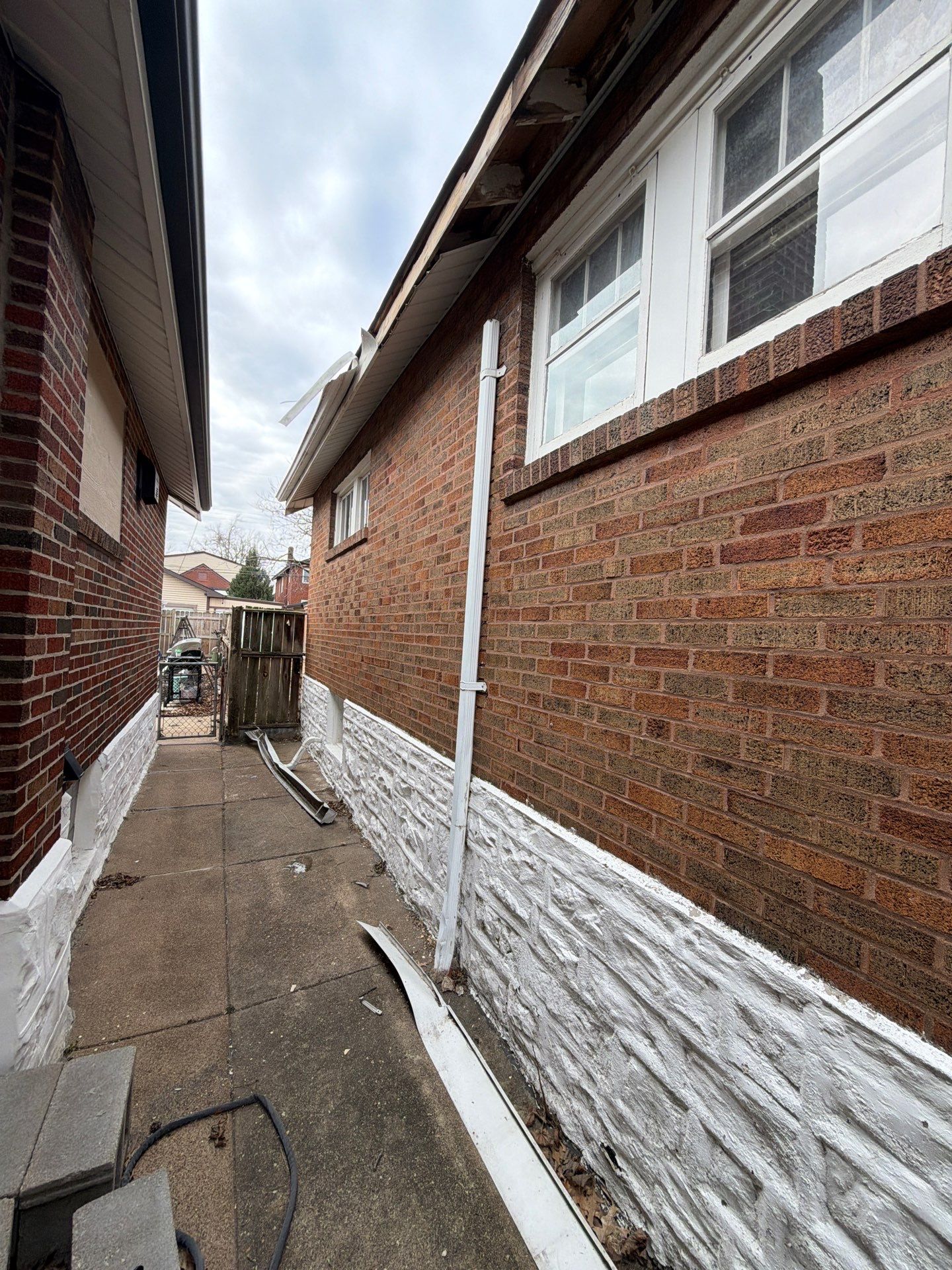 Holly Hills Storm Restoration: Soffit Repair & 6" Gutter Upgrade (South St. Louis) by Acute Roofing And Exteriors