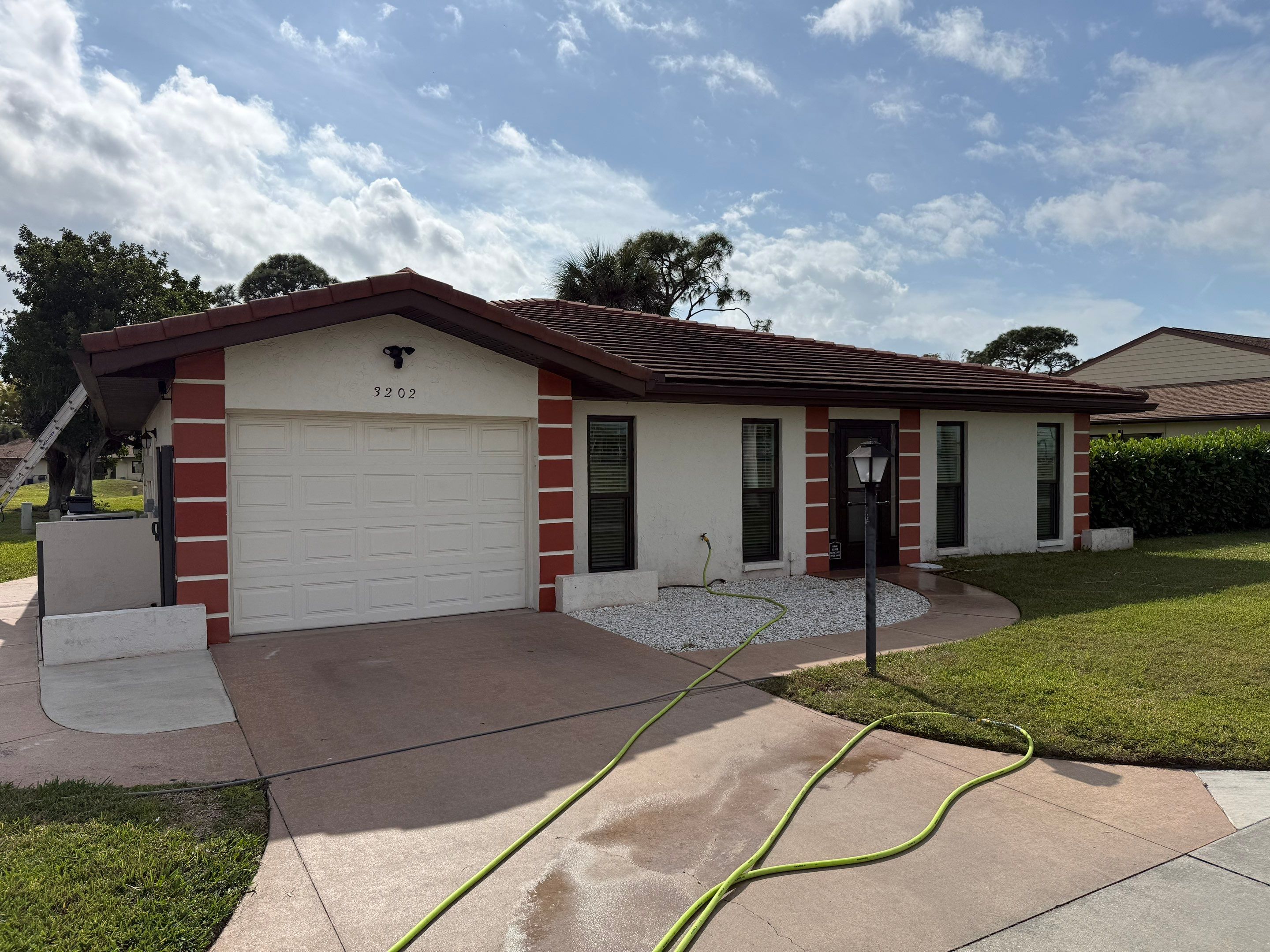 Neighboring Tile Roof Cleanings in Vivienda at Bradenton I – Bradenton, FL by Sunshine AquaWash