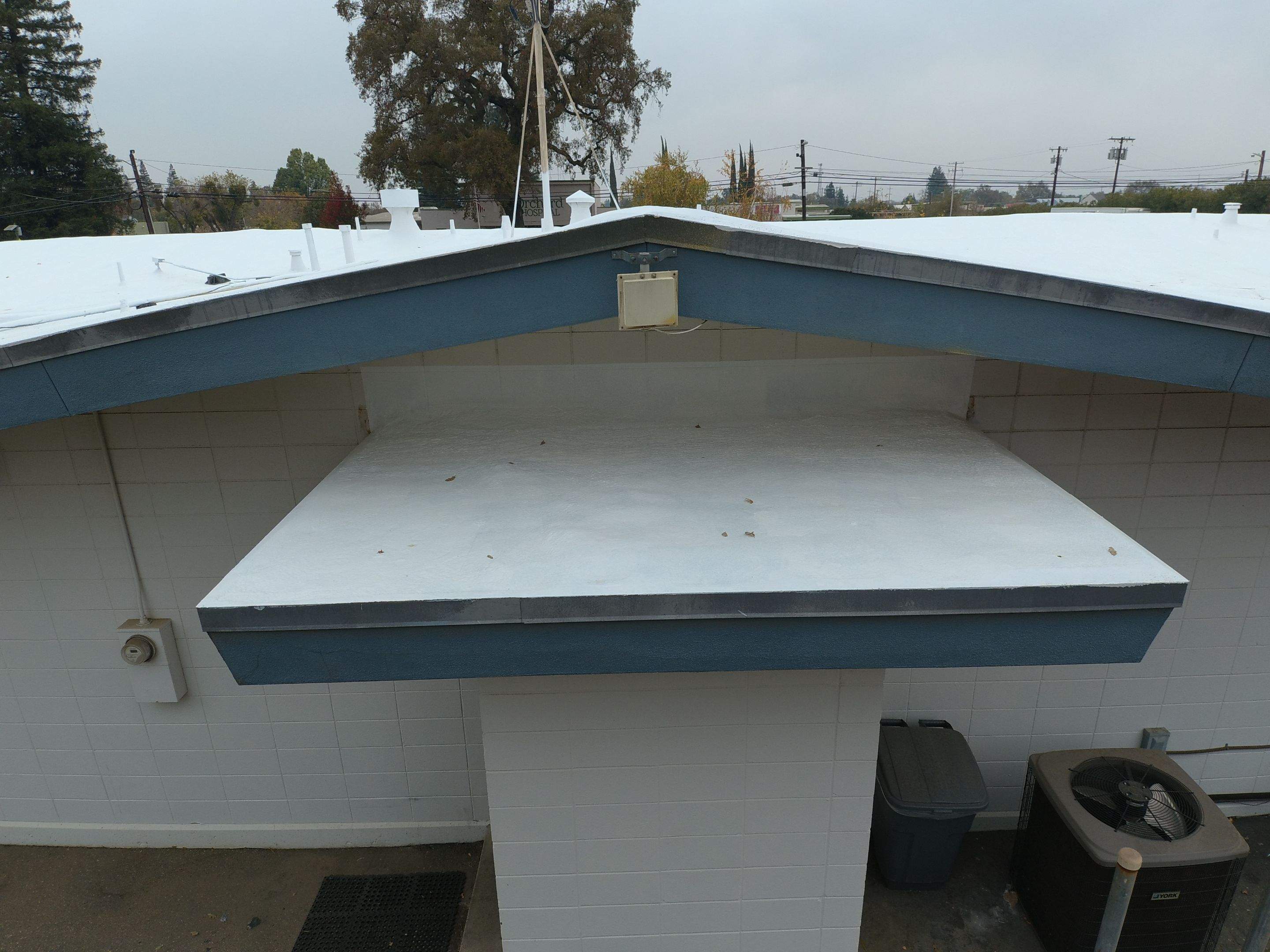 Spray foam and coatings using Conklin Benchmark/PUMA XL coatings and spray foam by Straight Edge Roofing Inc