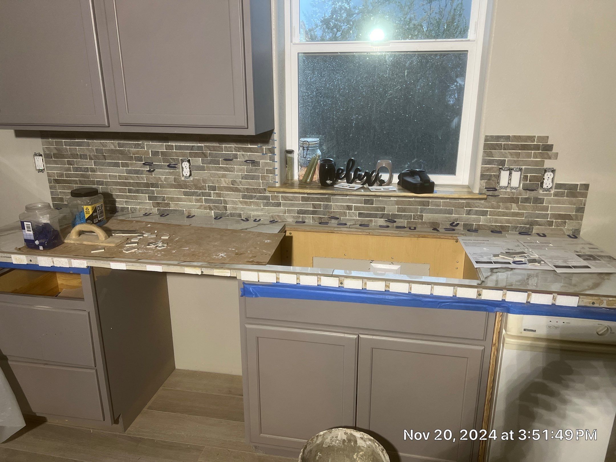 Marble Look Countertop and Stone Tile Backsplash Installation in Brookings by KMD Surfaces INC.