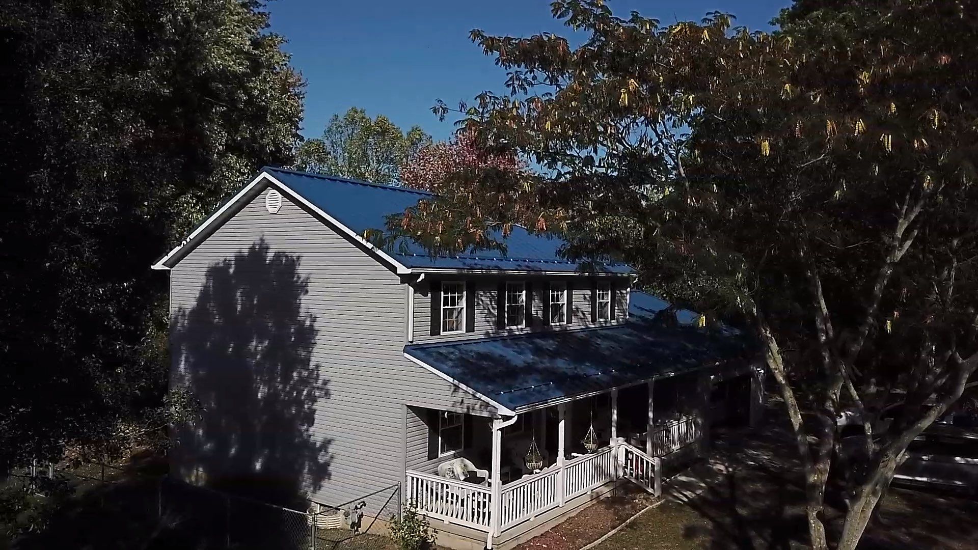 Residential Roofing Installation using Standing Seam Metal - Gallary Blue by RoofX 