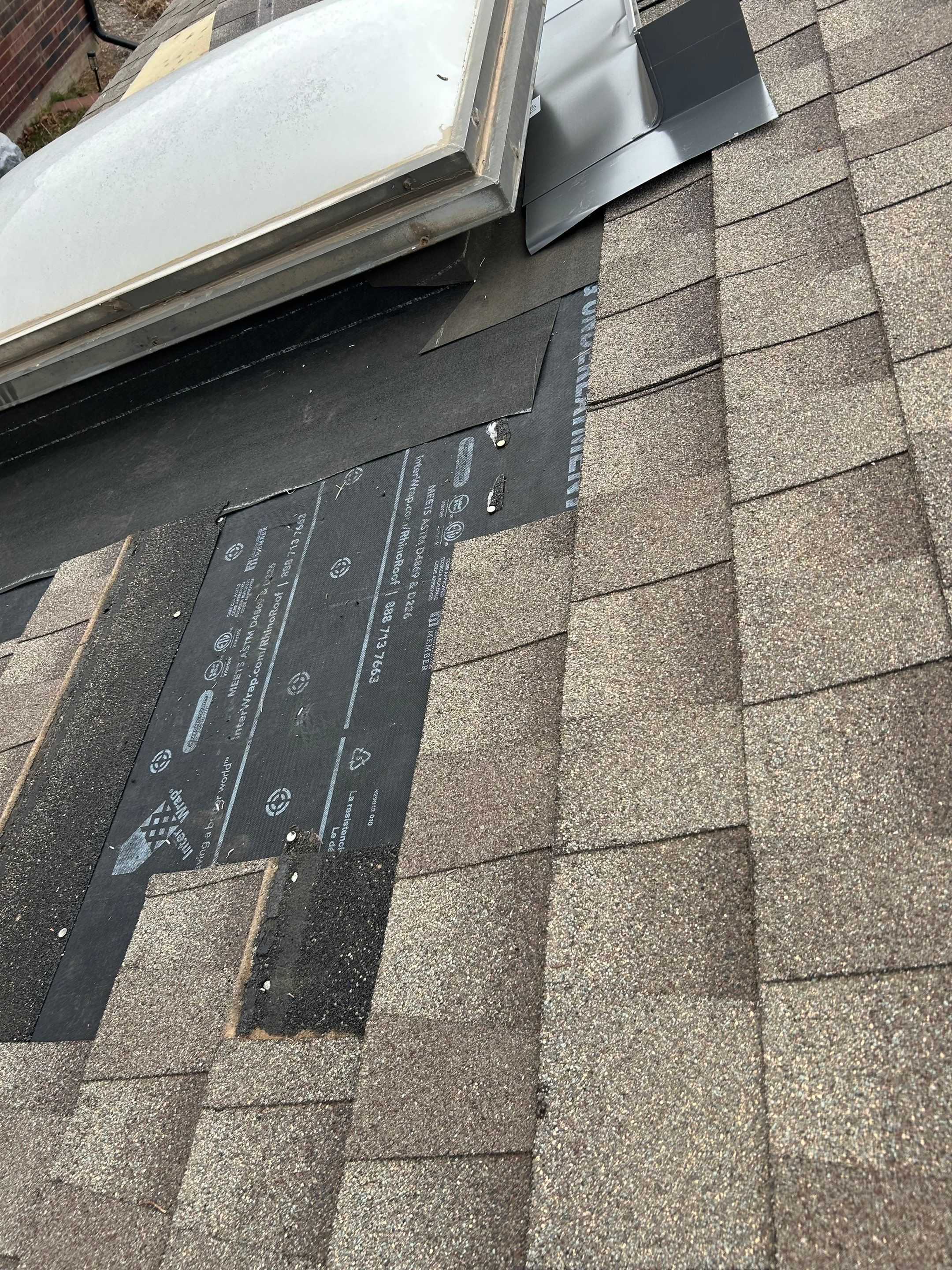 Roof Replacement & Skylight Project in Edmond, OK by McCann's Roofing and Construction