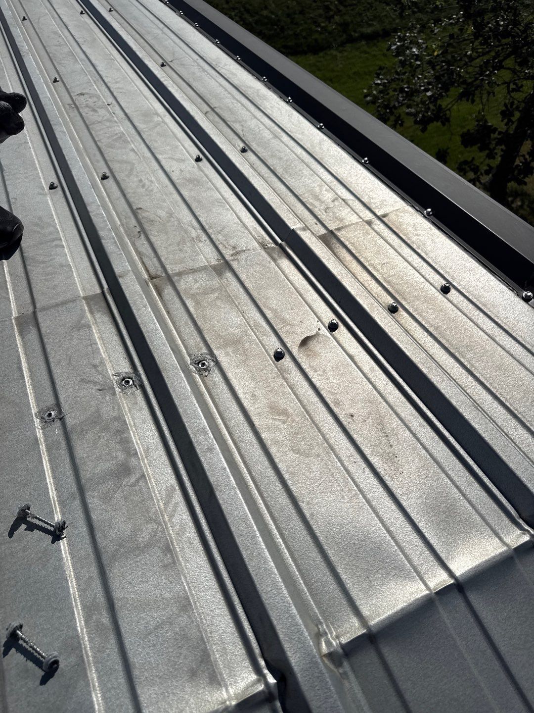 Metal Roof Fastener Replacement and Seam Sealing in West Point, NE by Crows Roofing LLC