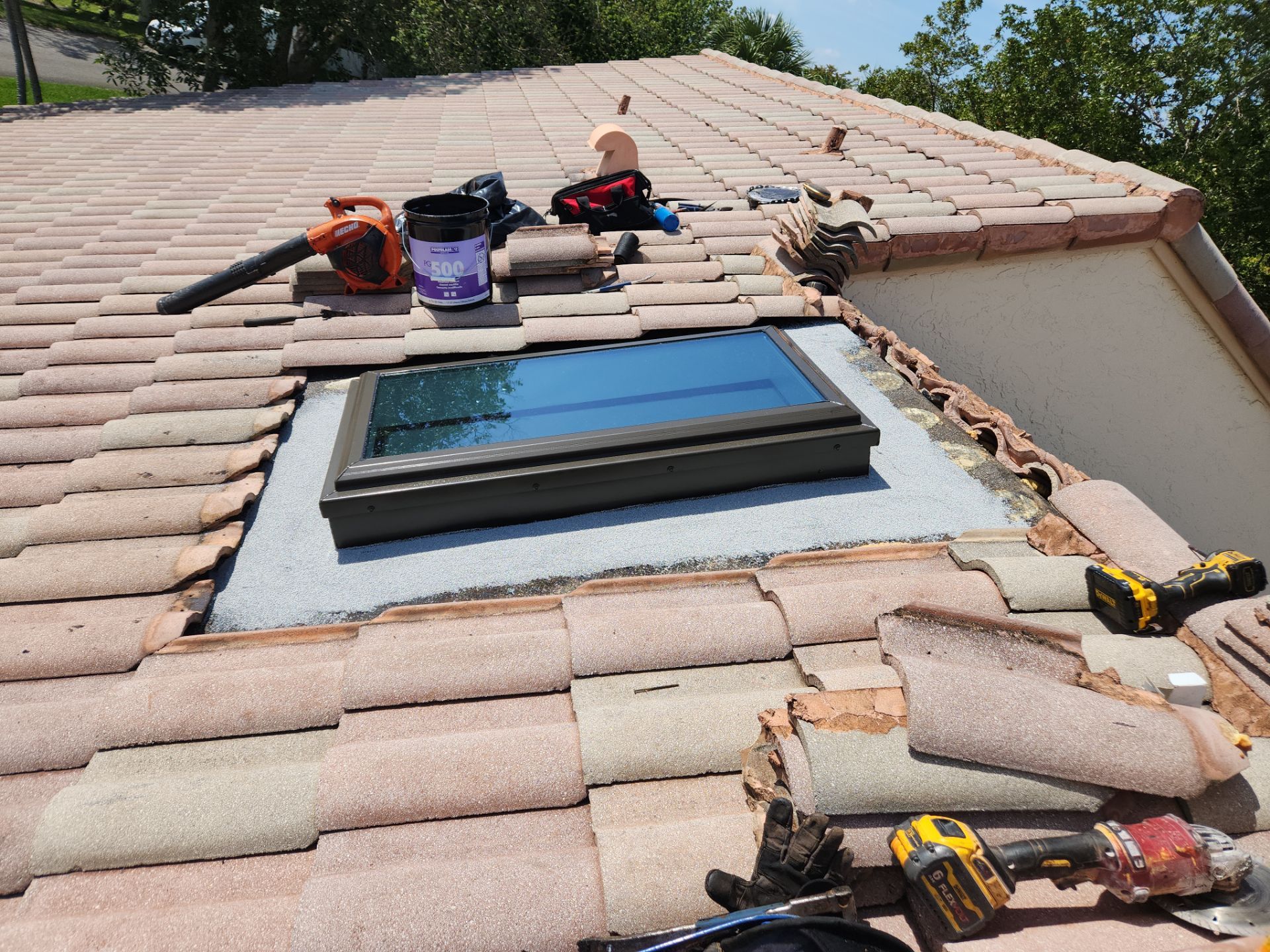 Concrete Tile Roof Repair using Skylight by Aastro Roofing