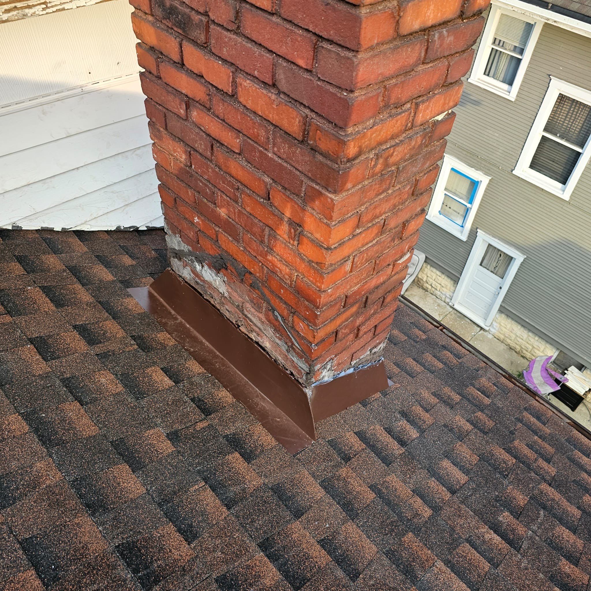 Residential Roofing Installation using GAF TImberline HDZ Hickory by Rainstoppers Roofing