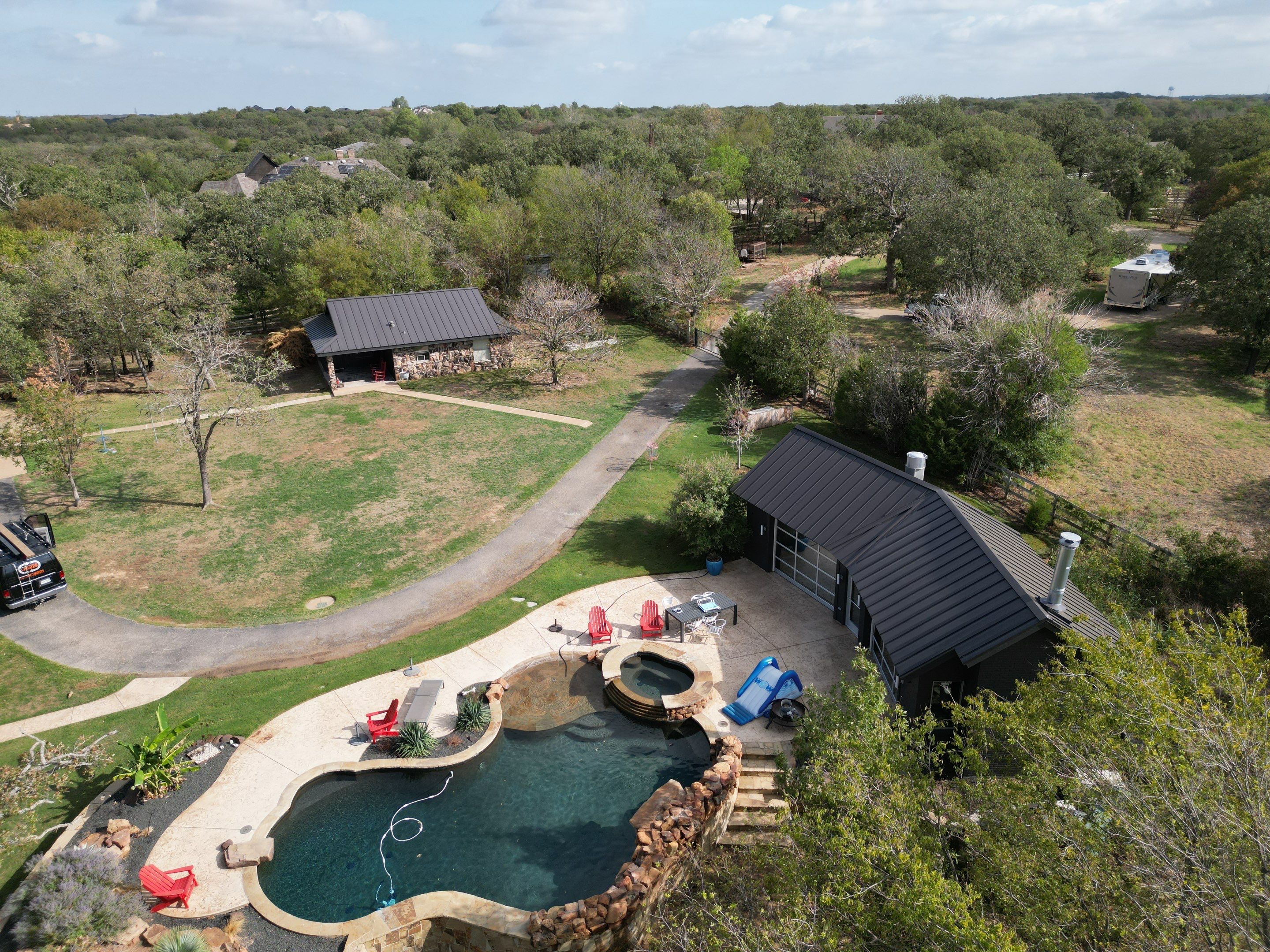 Dark Bronze Standing Seam Metal Roof by First Out Roofing 