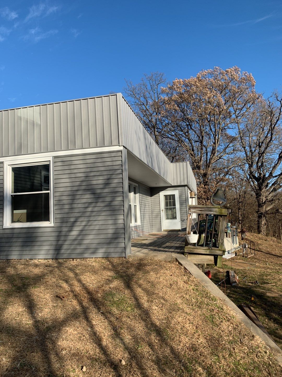 Contemporary house Siding Installation using Mastic Premium Vinyl siding  by EEC  Windows, Siding & Roofing 