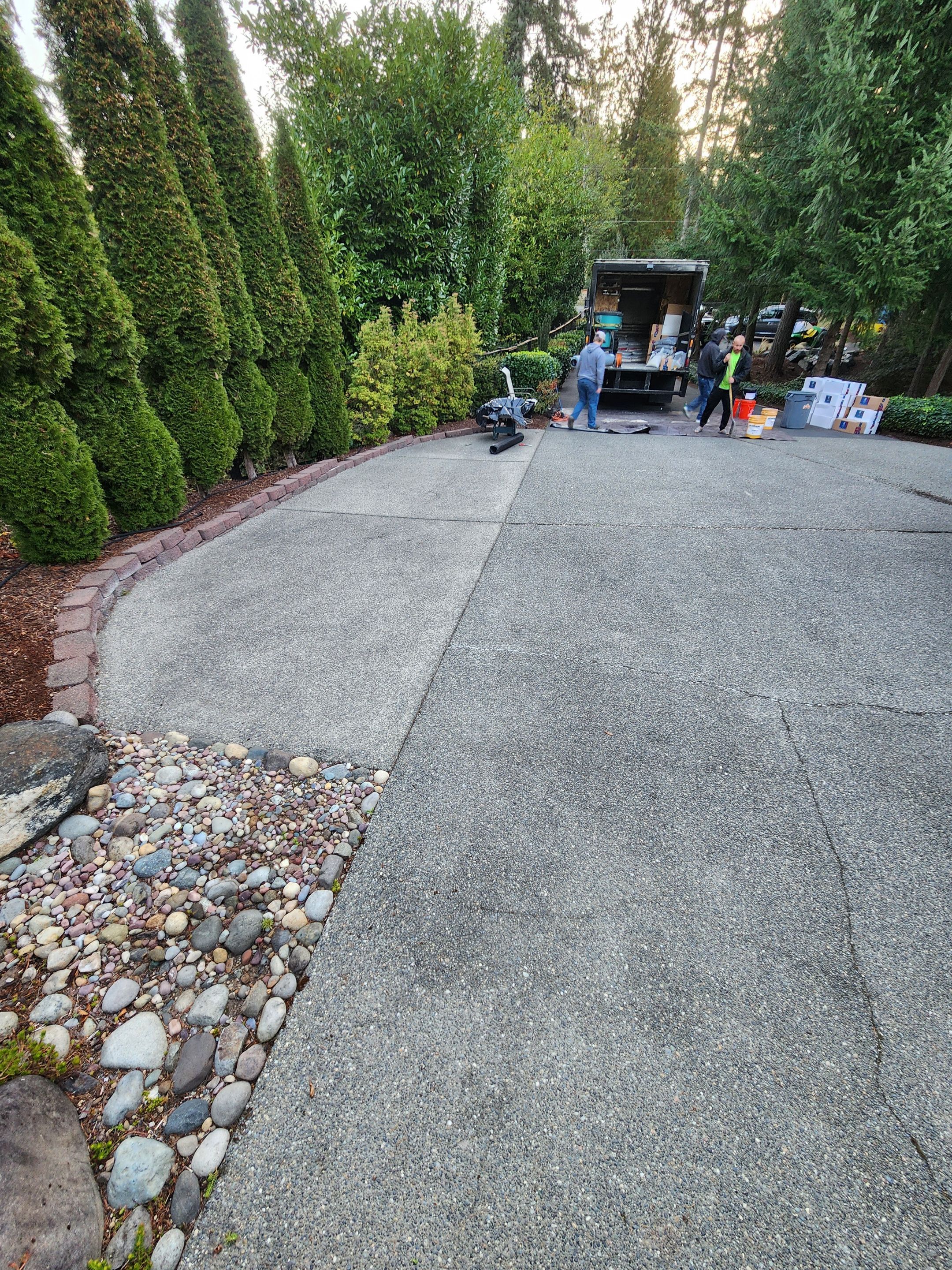 Walkway and driveway by Concrete Coating Experts Inc.