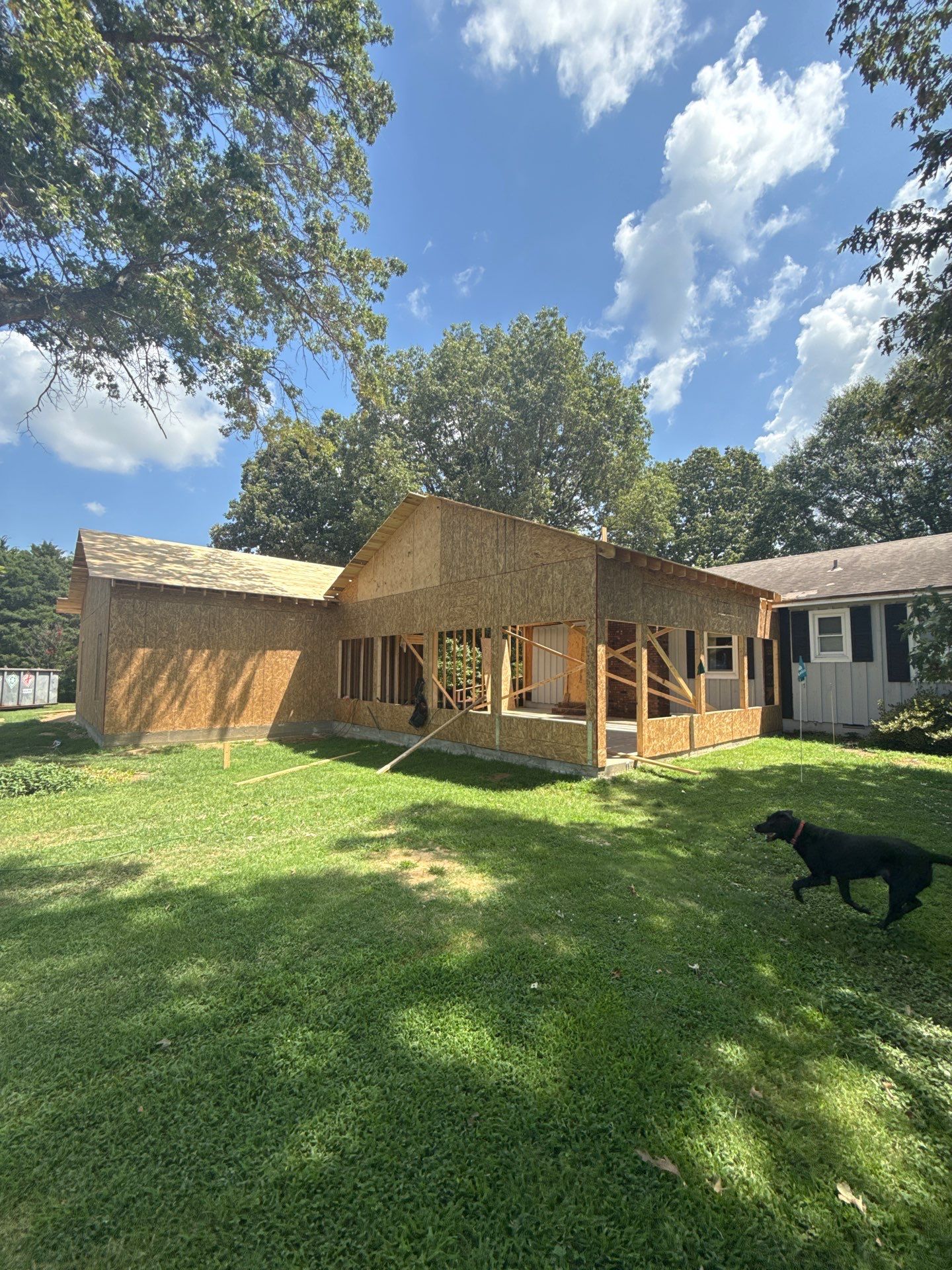 Sunroom and Garage Addition by Skilled Construction LLC