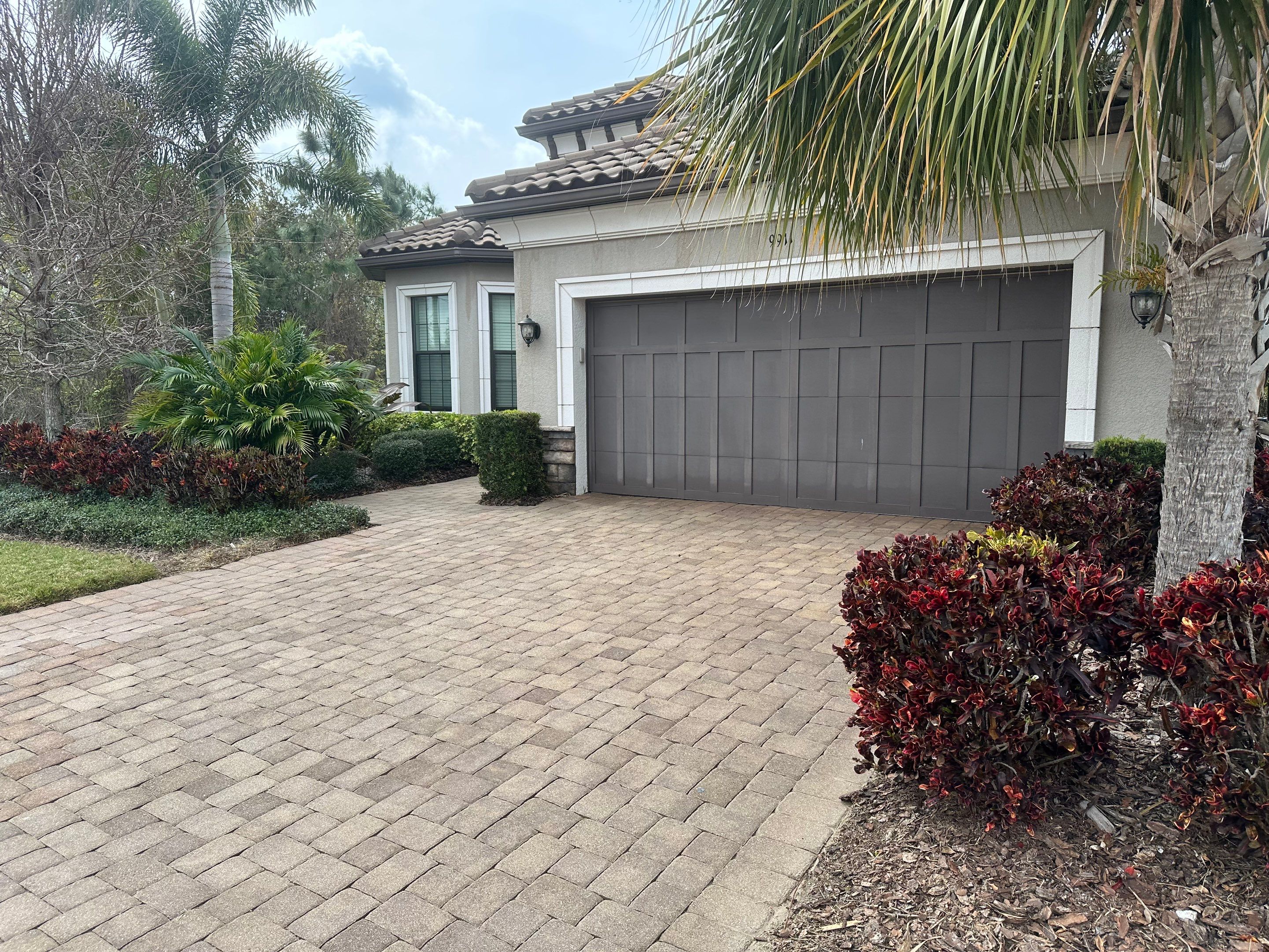 Concrete Tile Roof, Paver Pool Deck, Screen Enclosure & Driveway Cleaning in Artisan Lakes Esplanade, Palmetto, FL | Sunshine AquaWash by Sunshine AquaWash