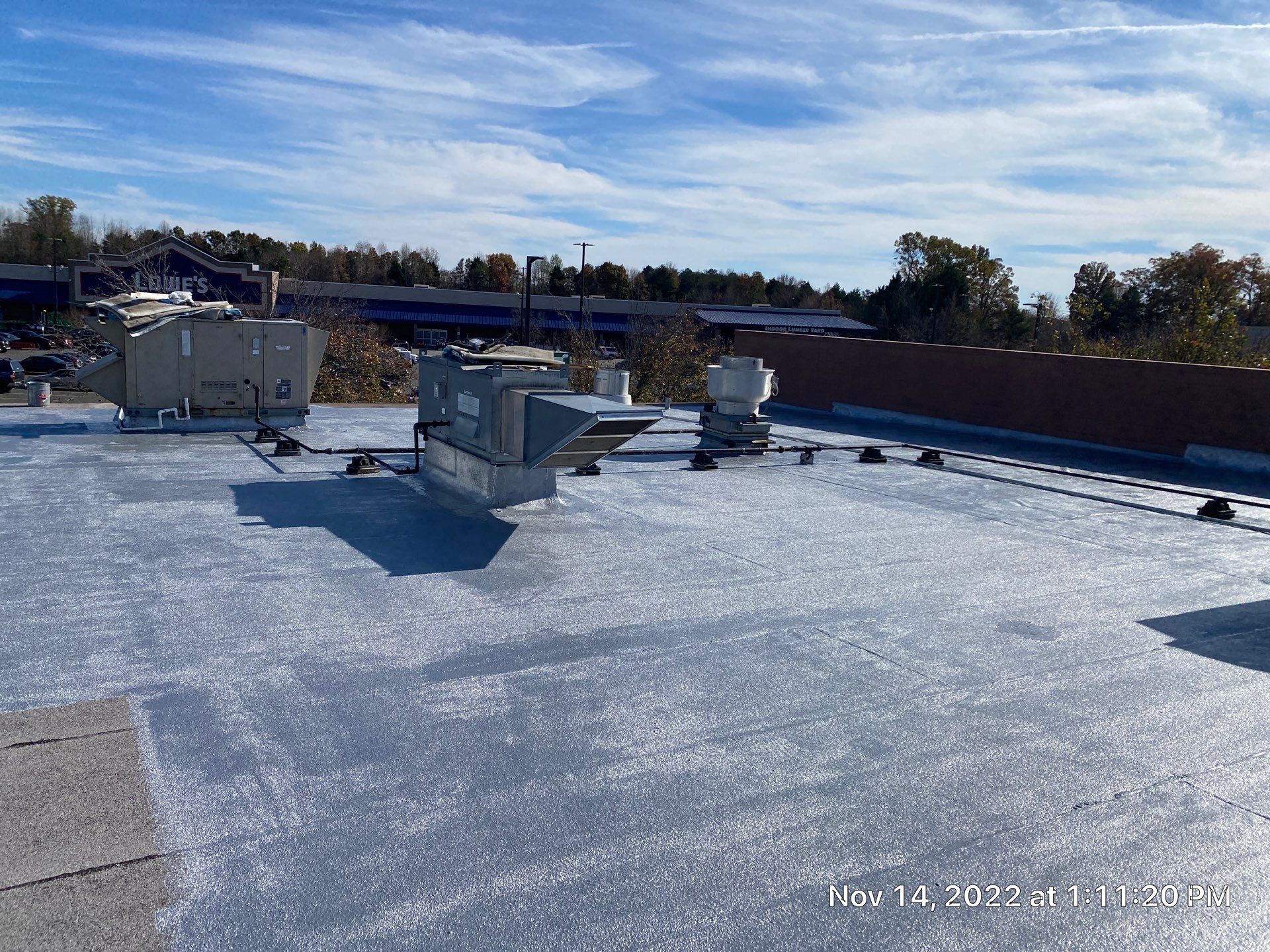 Commercial Coating using Poly Urerthane and Silicone Coating by Just In Time Roofing and Restoration