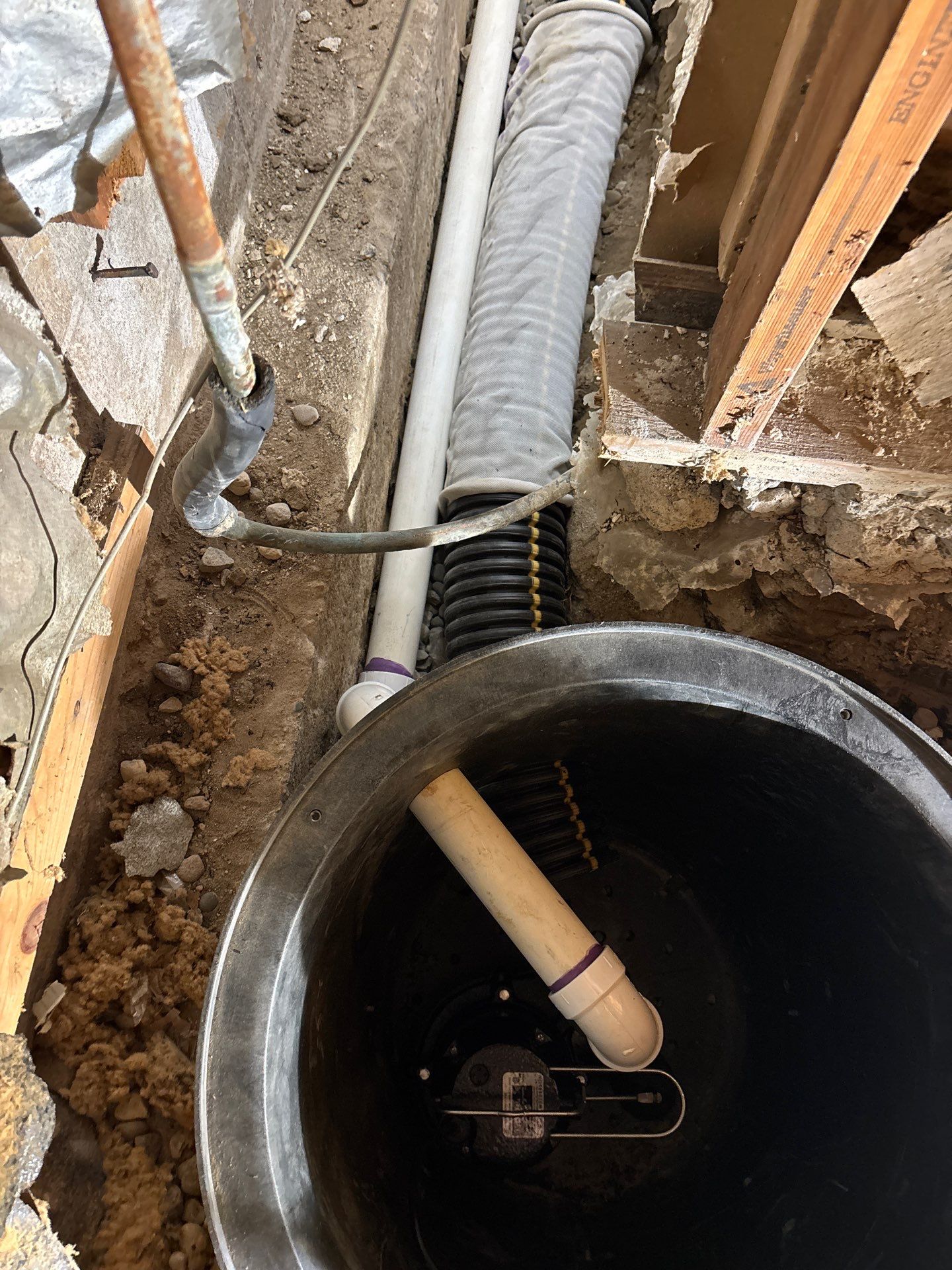 Drain tile and sump pump for George by Waterproofing Northeast