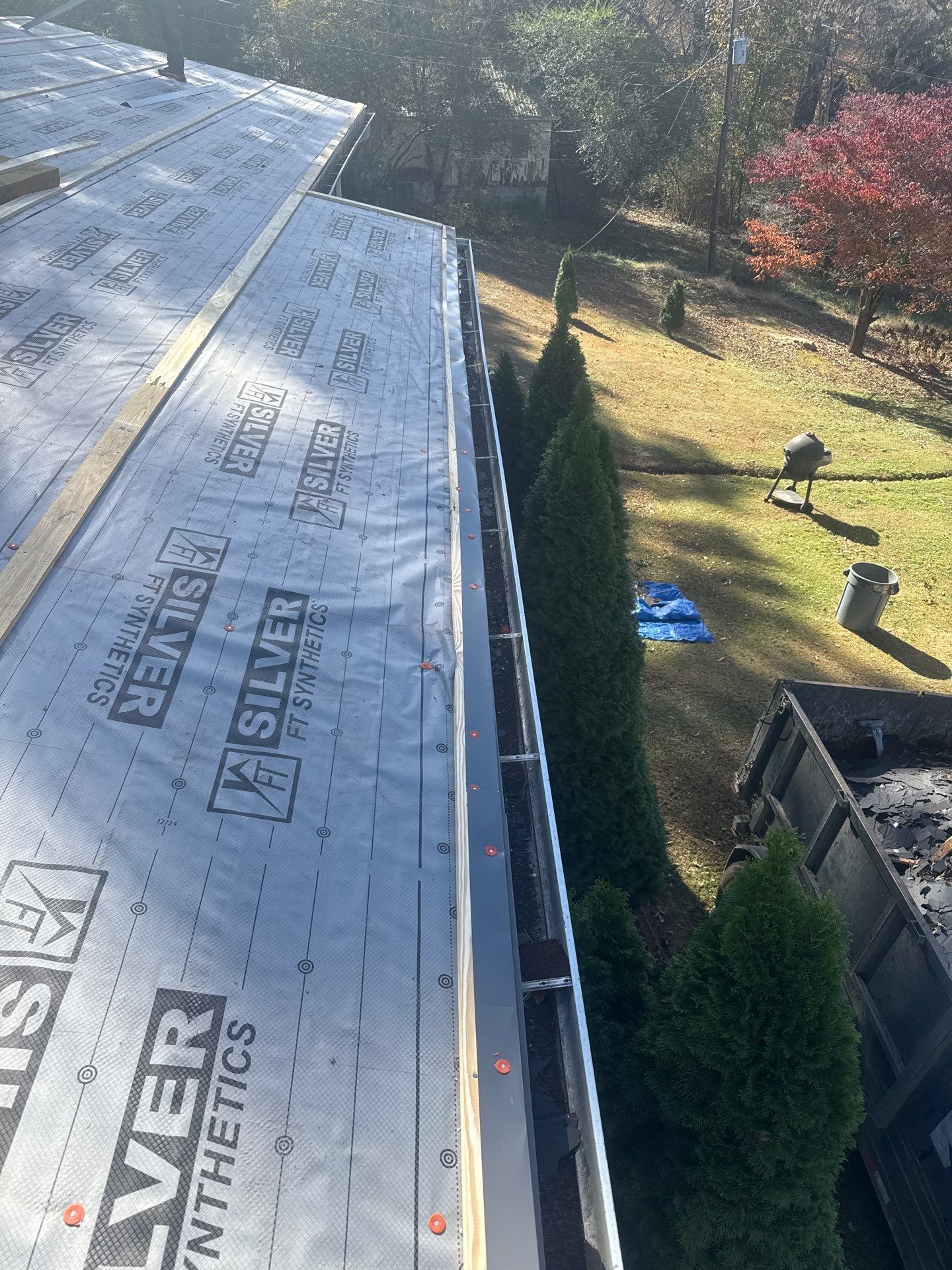 Roof Replacement in Pinson (Metal Roof) by The Roofing Dudes