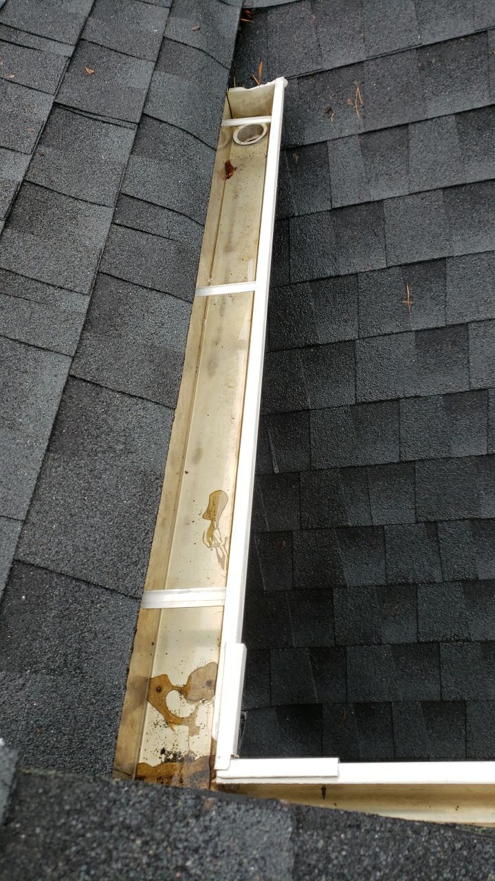 Gutter Cleaning using water by Power Wash Masters LLC