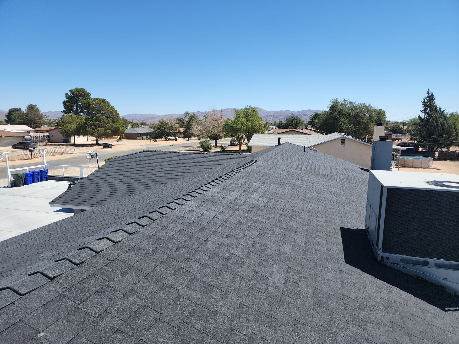 Onyx Black Shingles by Reimagine Roofing