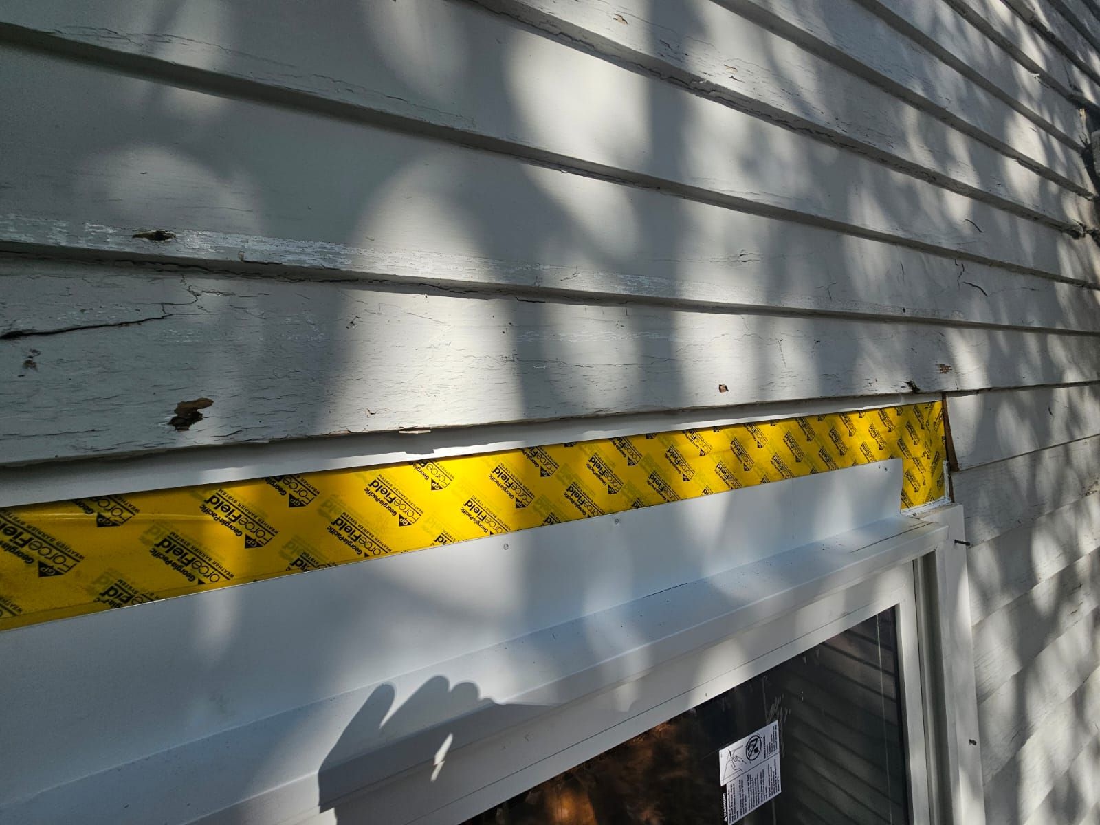 Patio Slider Door and Rear Deck  by Avalon Roofing and Exteriors