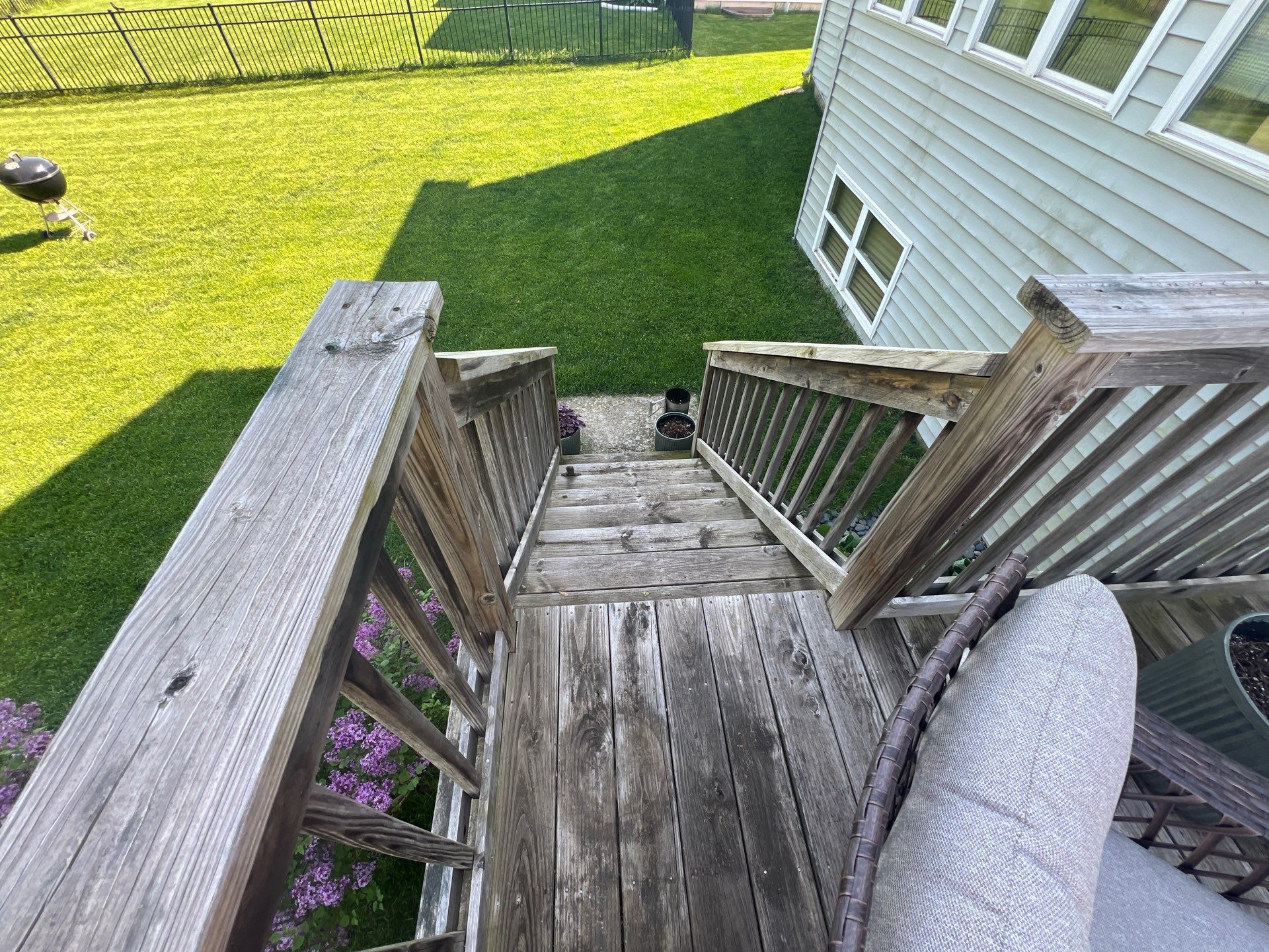 wood deck cleaning and staining by Northern Power Washing LLC.