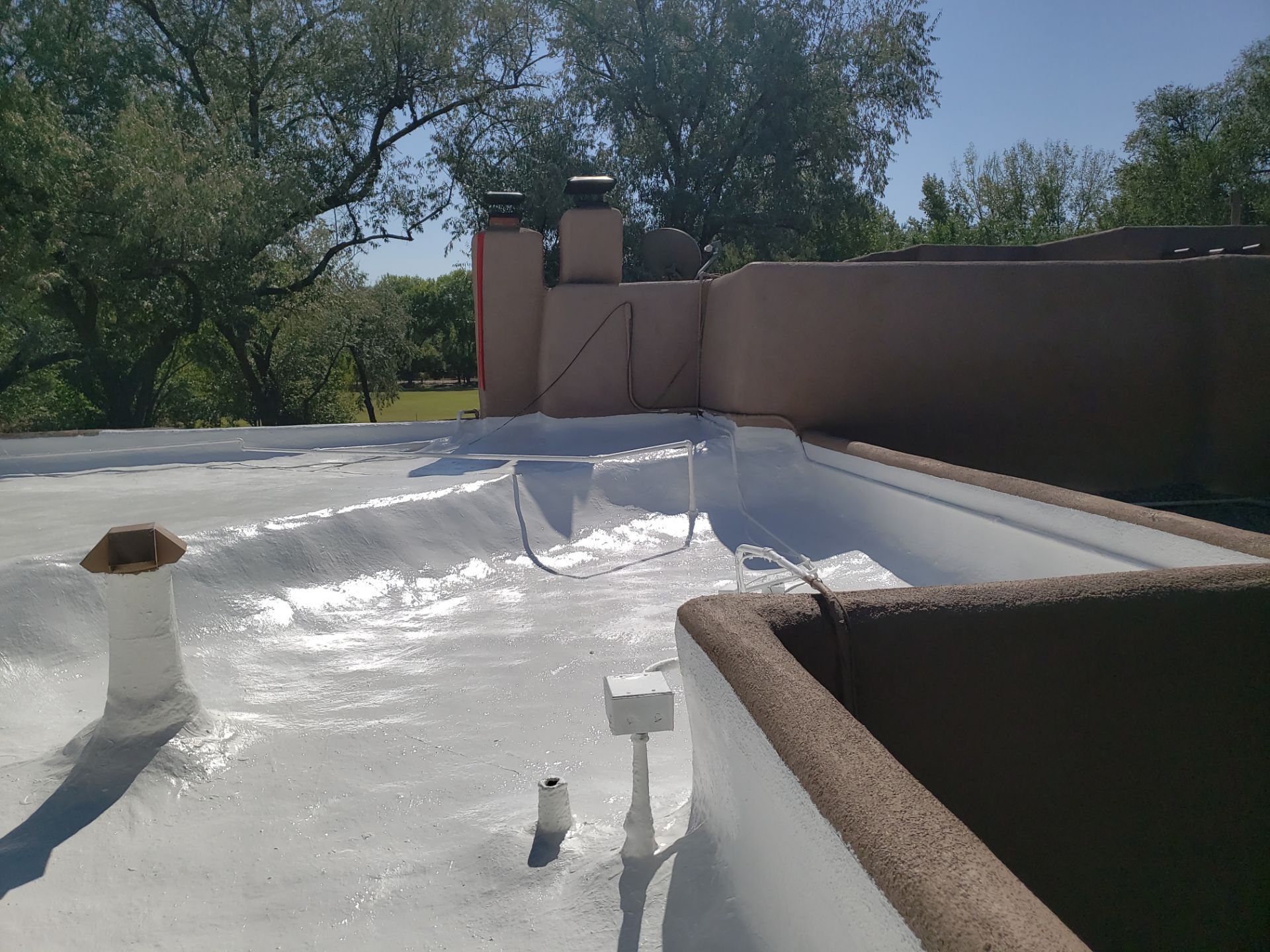 Residential roof application by SPF Services 