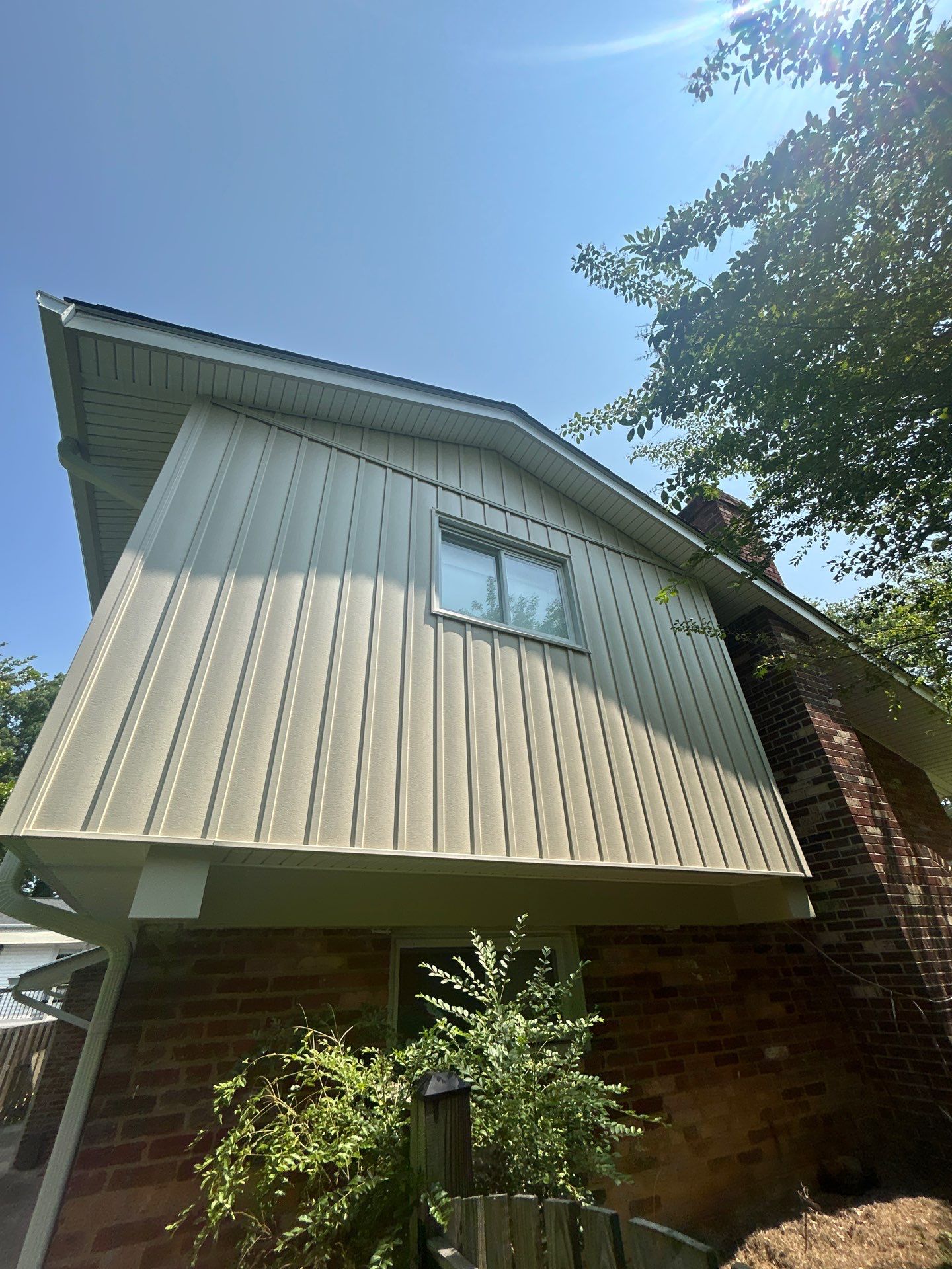 Fairfax: Residential Siding Replacement with CertainTeed 8" Board and Batten Siding in Desert Tan by RM Banning, Inc.