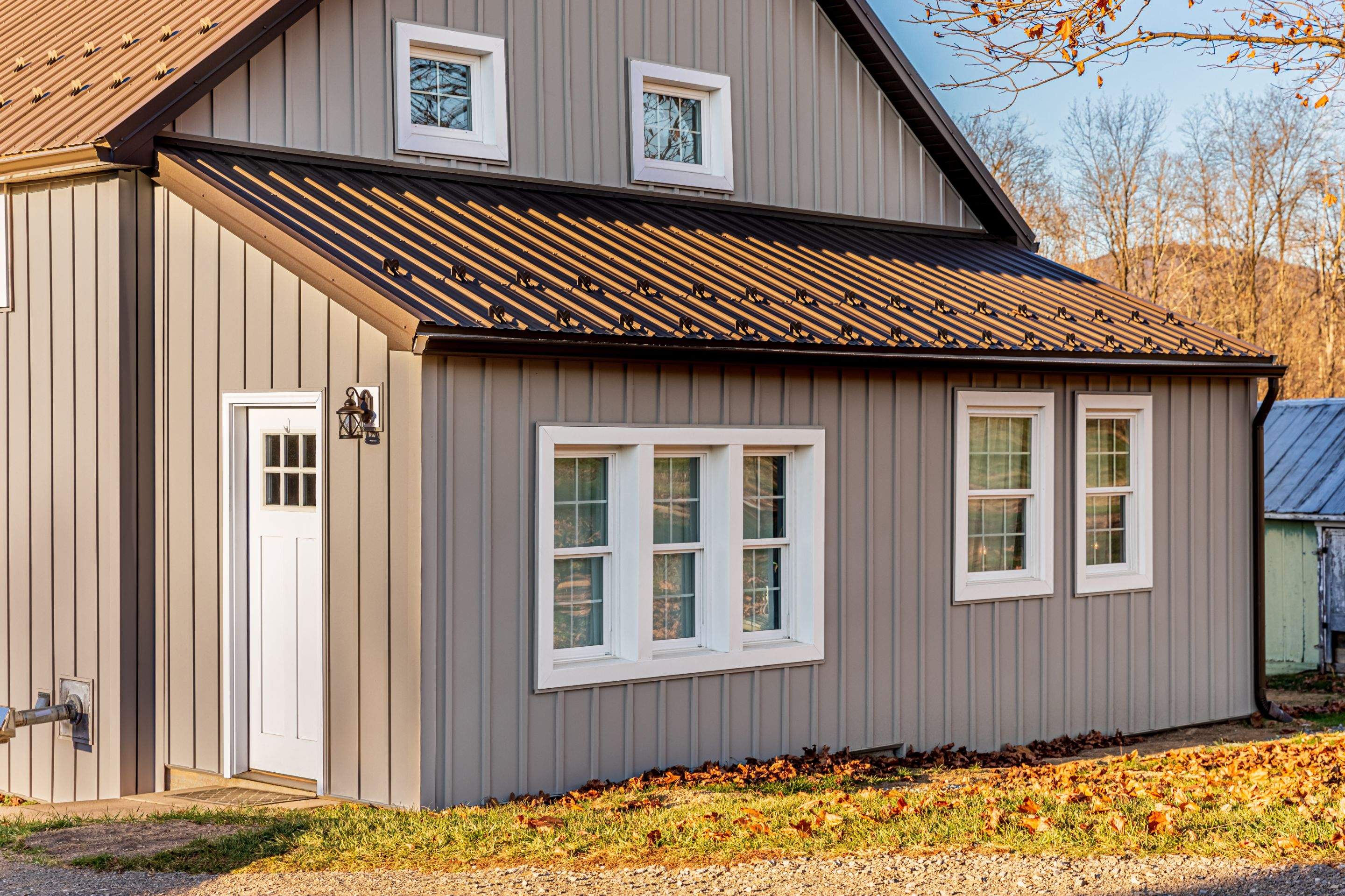 Metal roof-charcoal  Metal siding-ash gray by Esh Builders