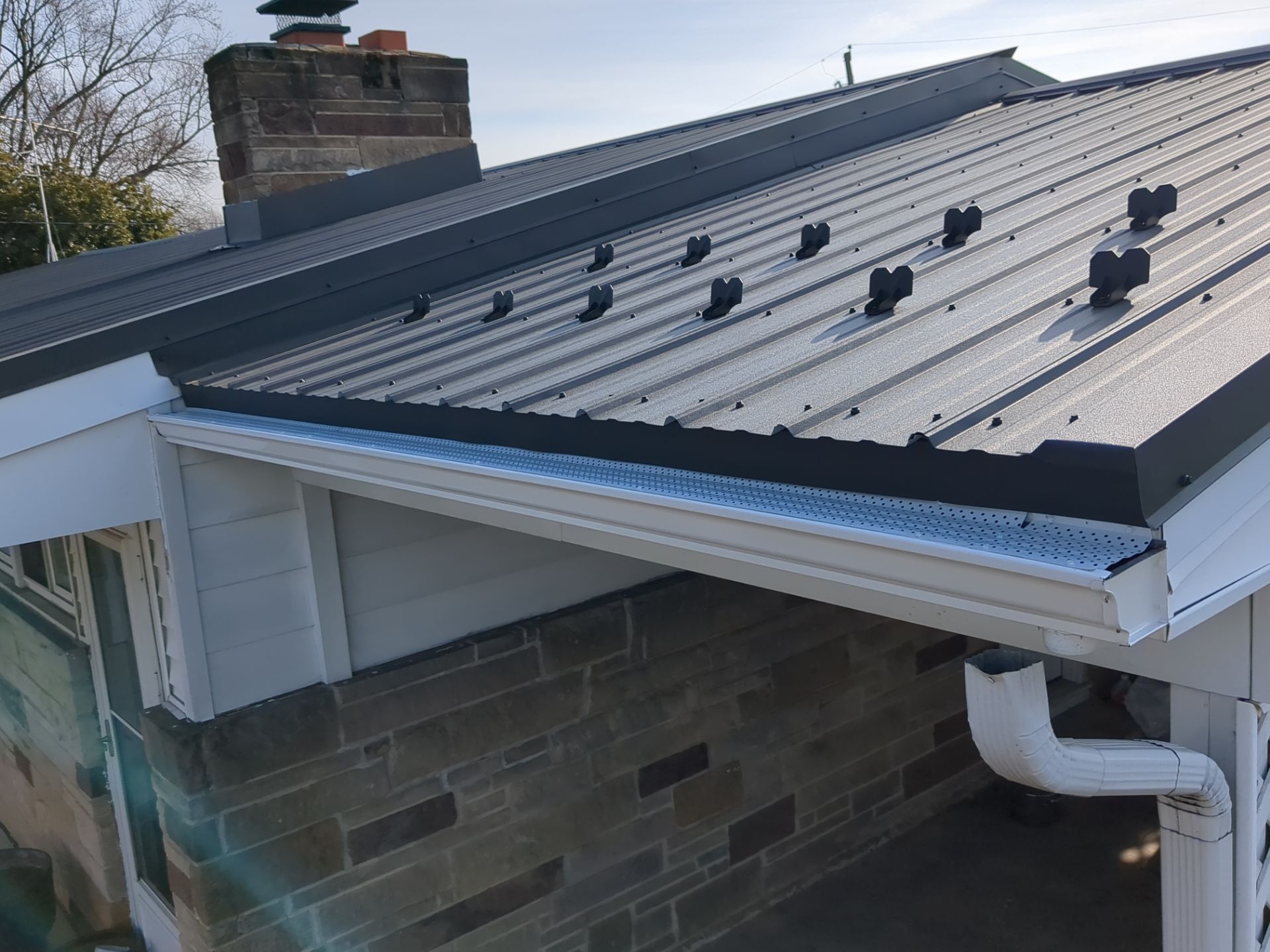 Metal Roofing Installation and Stone Veneer Exterior Refresh in Camp Hill by Esh Builders
