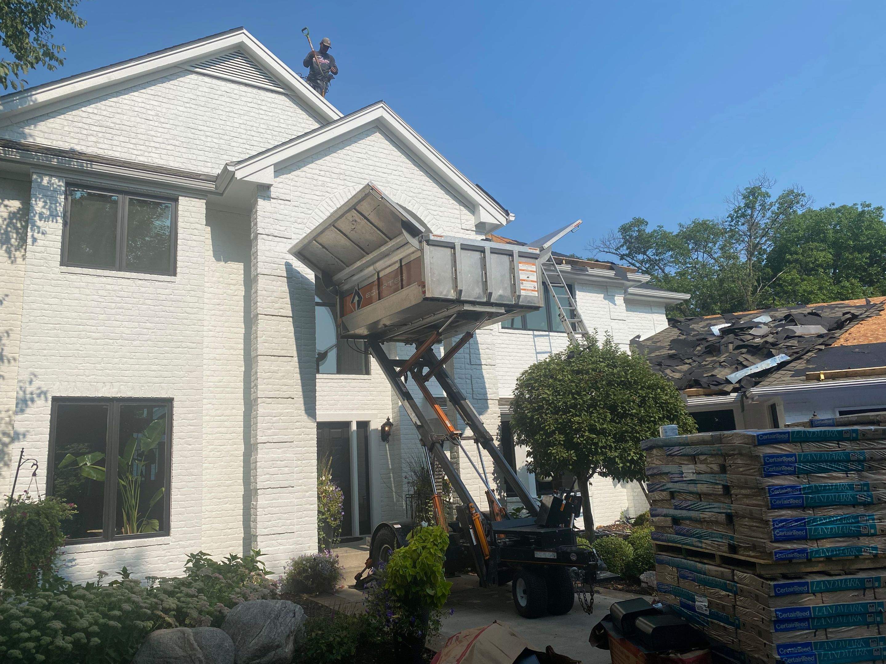 Residential Roofing Installation using Certainteed Landmark Moire Black by MODERN EXTERIOR SYSTEMS