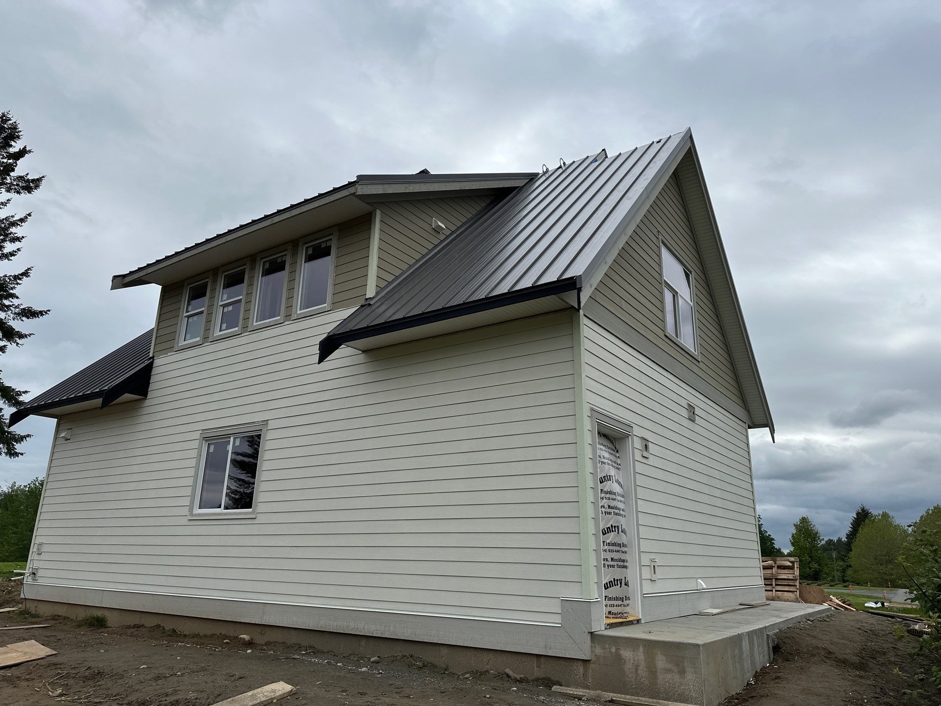 Residential Roofing Installation using 12" Prolok metal  by Top Notch Roofing Inc