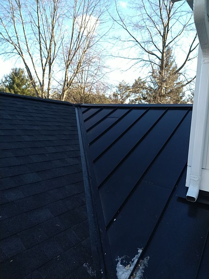 James Hardie Siding  using James Hardie Board and Batten, White by Absolute Roofing and Construction