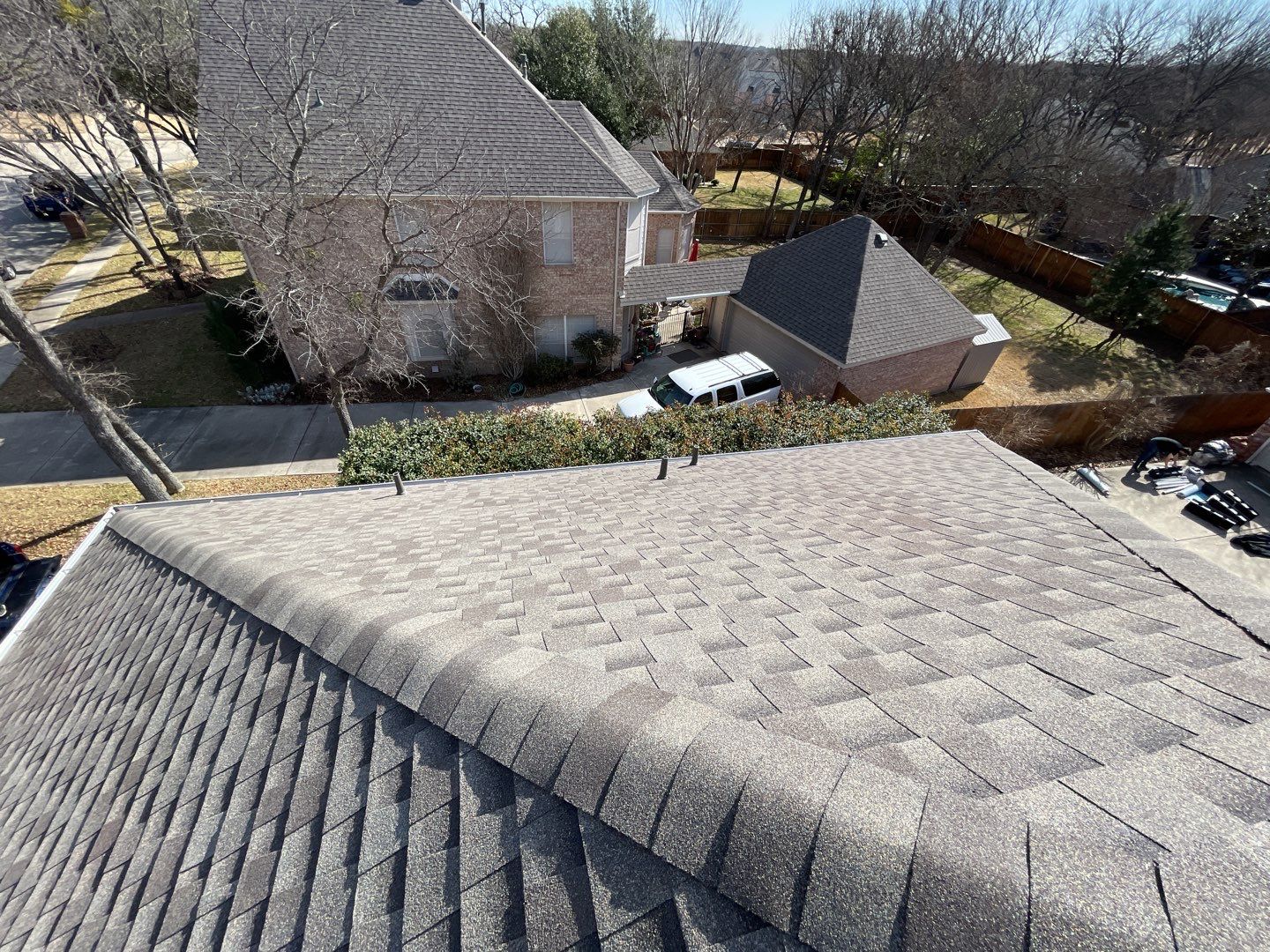 Major storm damage required full roof replacement along with other exterior repairs by First United Roofing & Construction