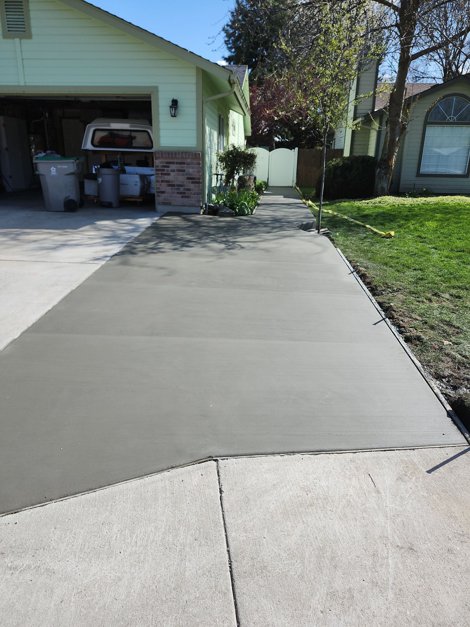 Gravel Walkway into Gorgeous New Concrete by Mr. Mudd Concrete