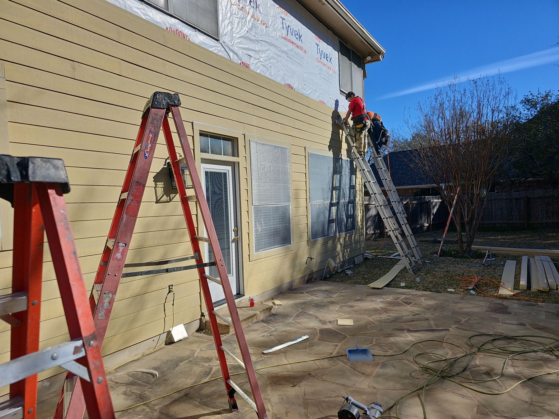 New Hardie Lap Siding & Board and Batten by DeZign Roofing & Exteriors