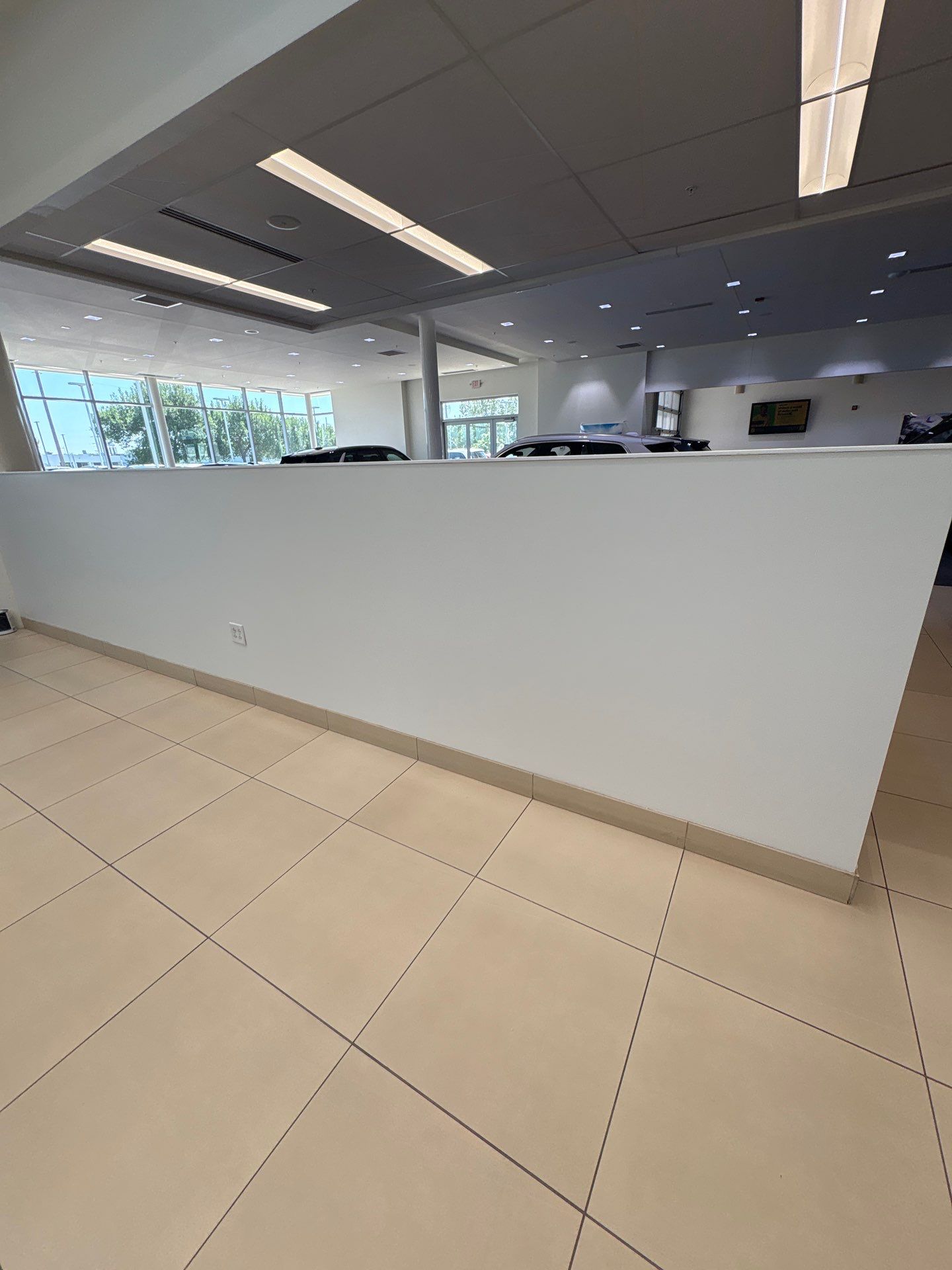 Interior Painting and Drywall Patching for Sioux Falls Commercial Showroom by Select Painting, Coatings & Garage Cabinets