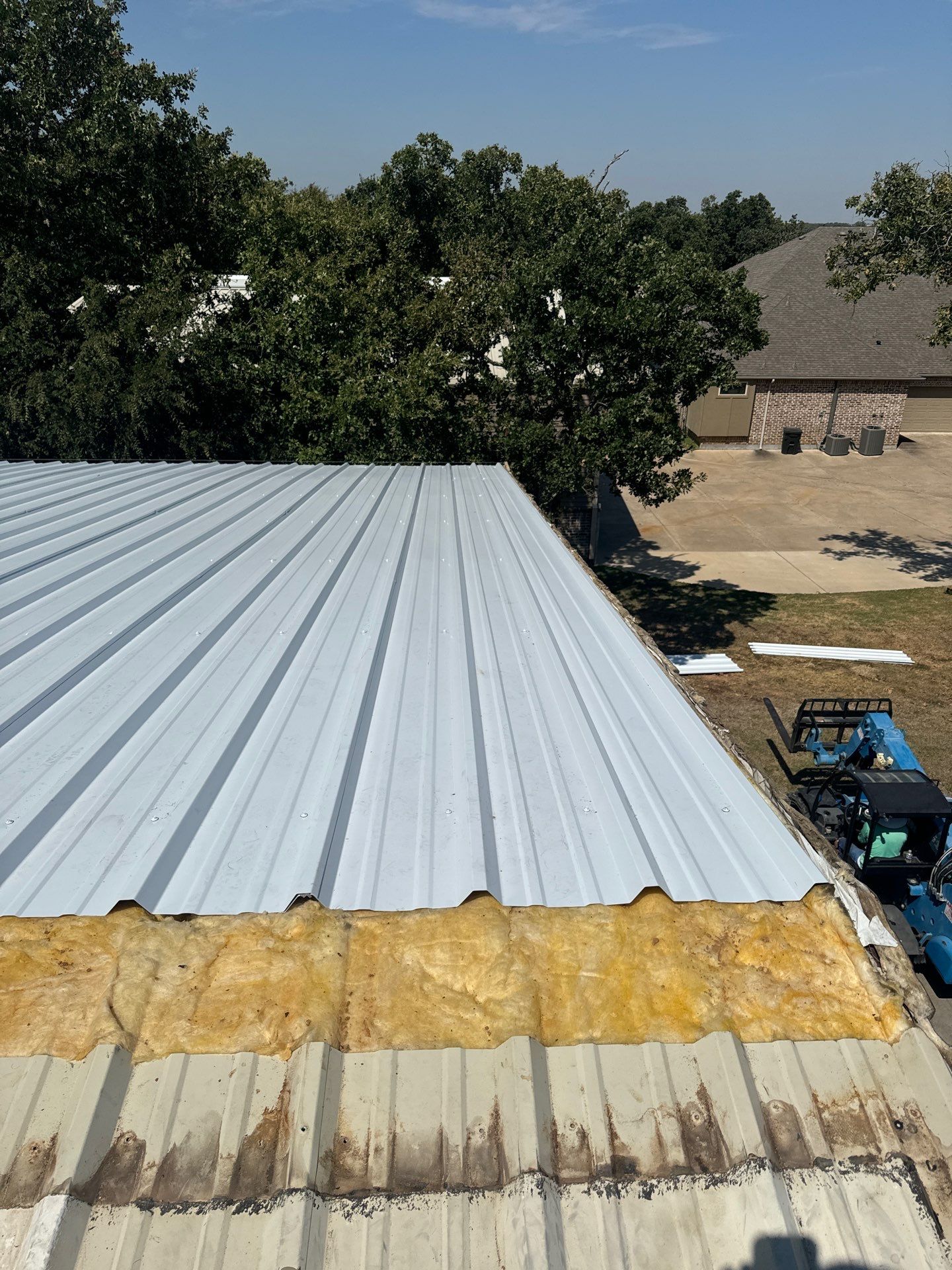 R-Panel Replacement by First Out Roofing 