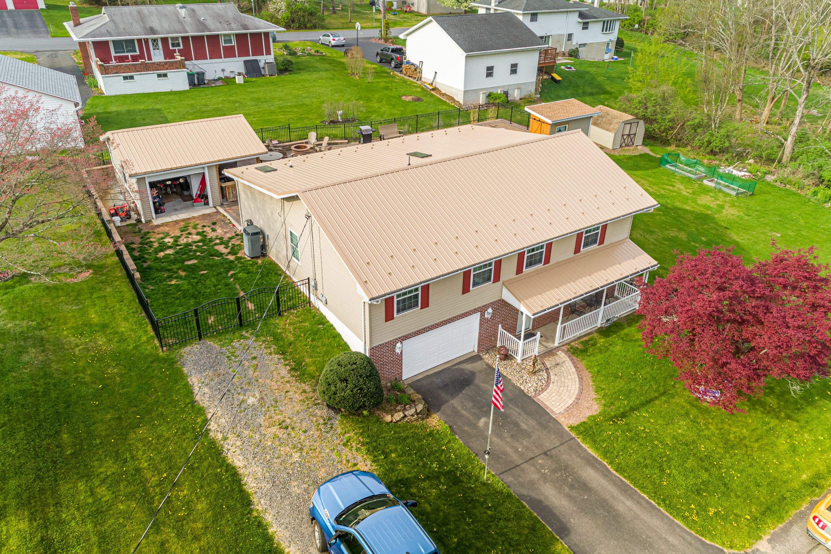 Metal Roof-tan by Esh Builders