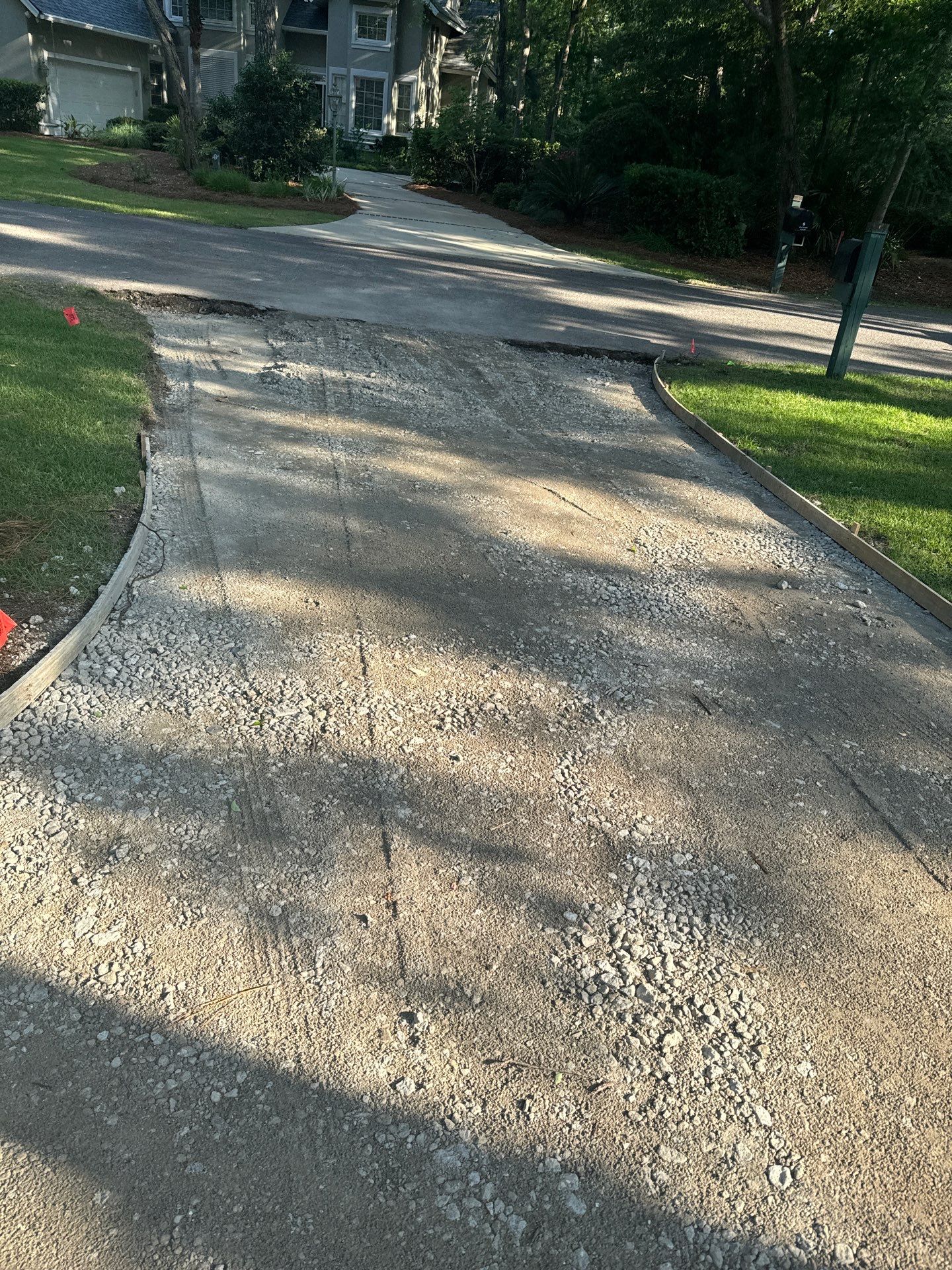 Hilton Head Island Concrete Driveway Replacement with Herringbone Brick Inlays by Lowcountry Scapes, LLC