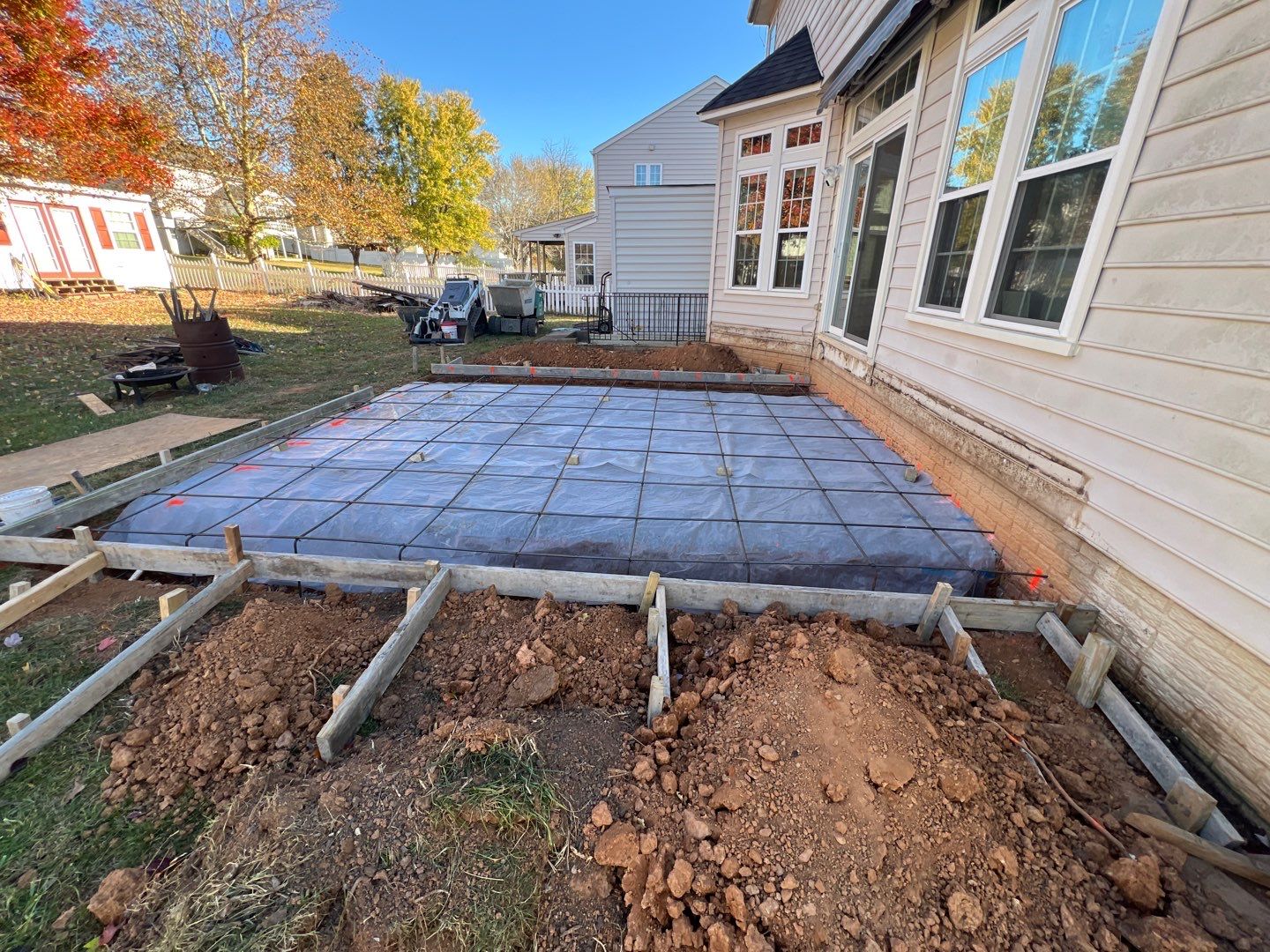 Custom Screened-In Porch with Stamped Concrete Patio in Warrenton by Jakari Restoration & Construction LLC