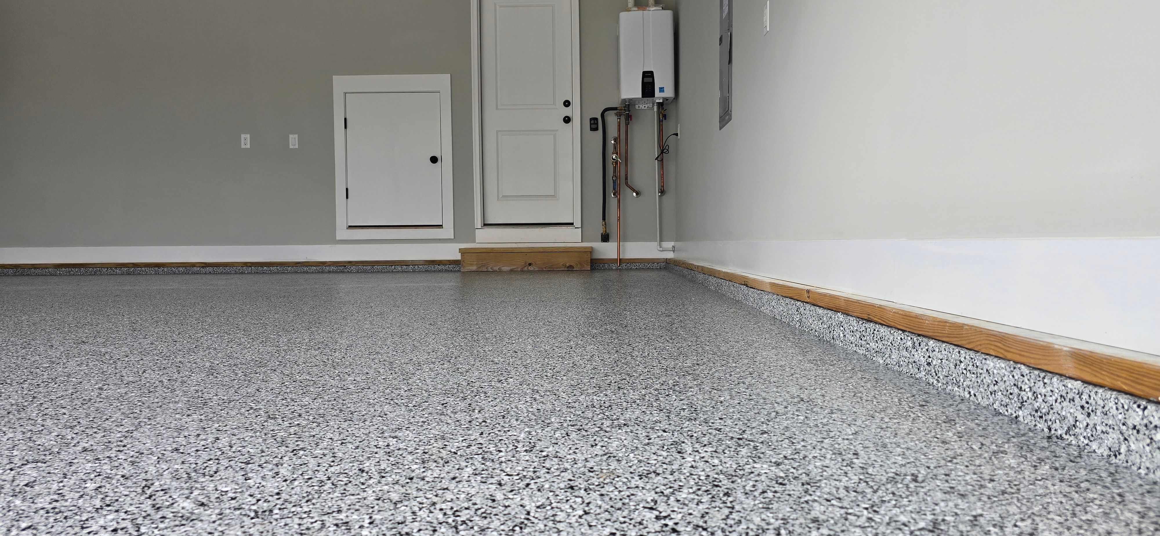 Garage using Houndstooth by Elite Floor Solutions