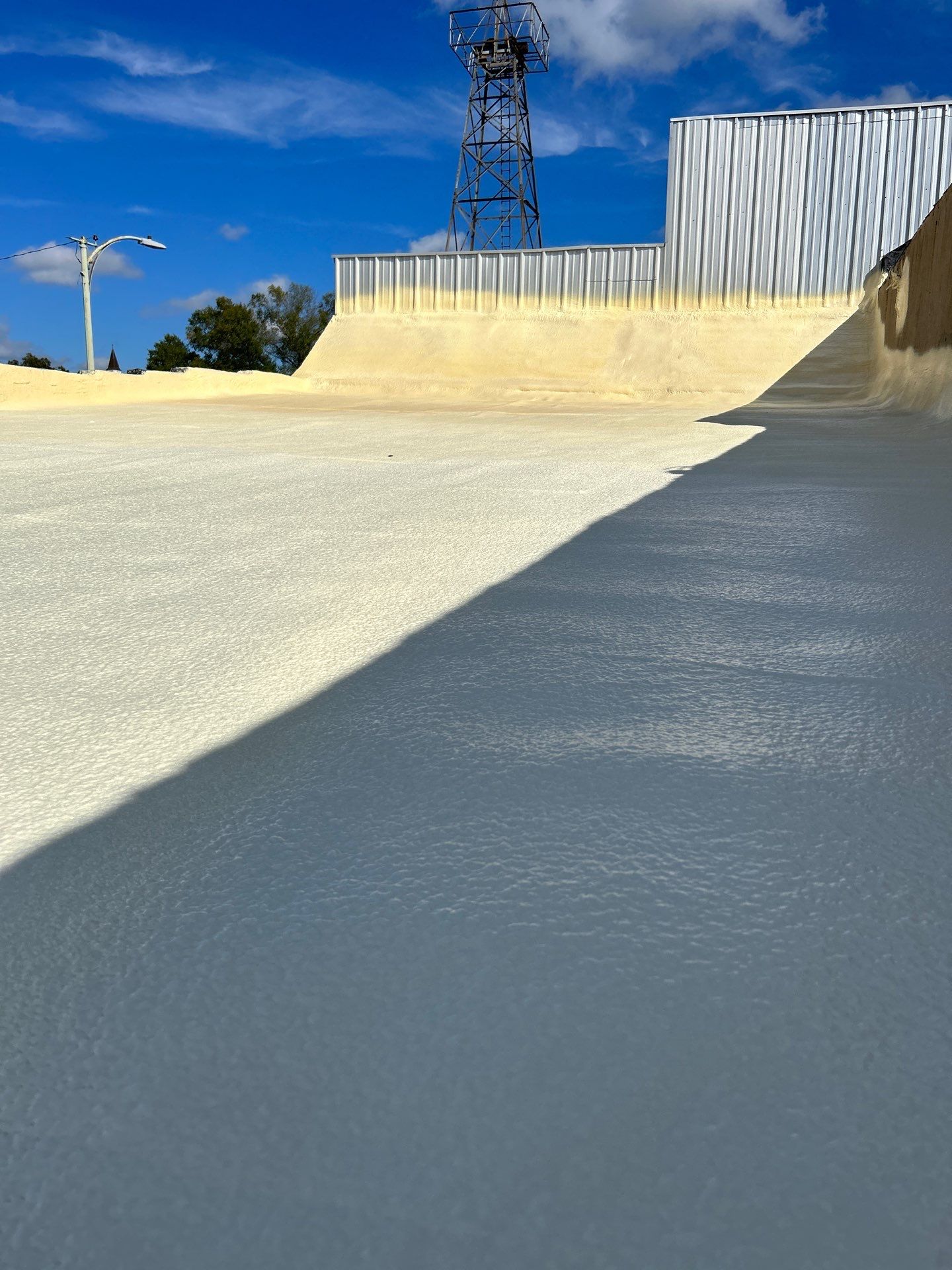 Downtown Gladewater Commercial Foam Roof Restoration – SPF + High-Tensile Acrylic by All Star Roofing LLC