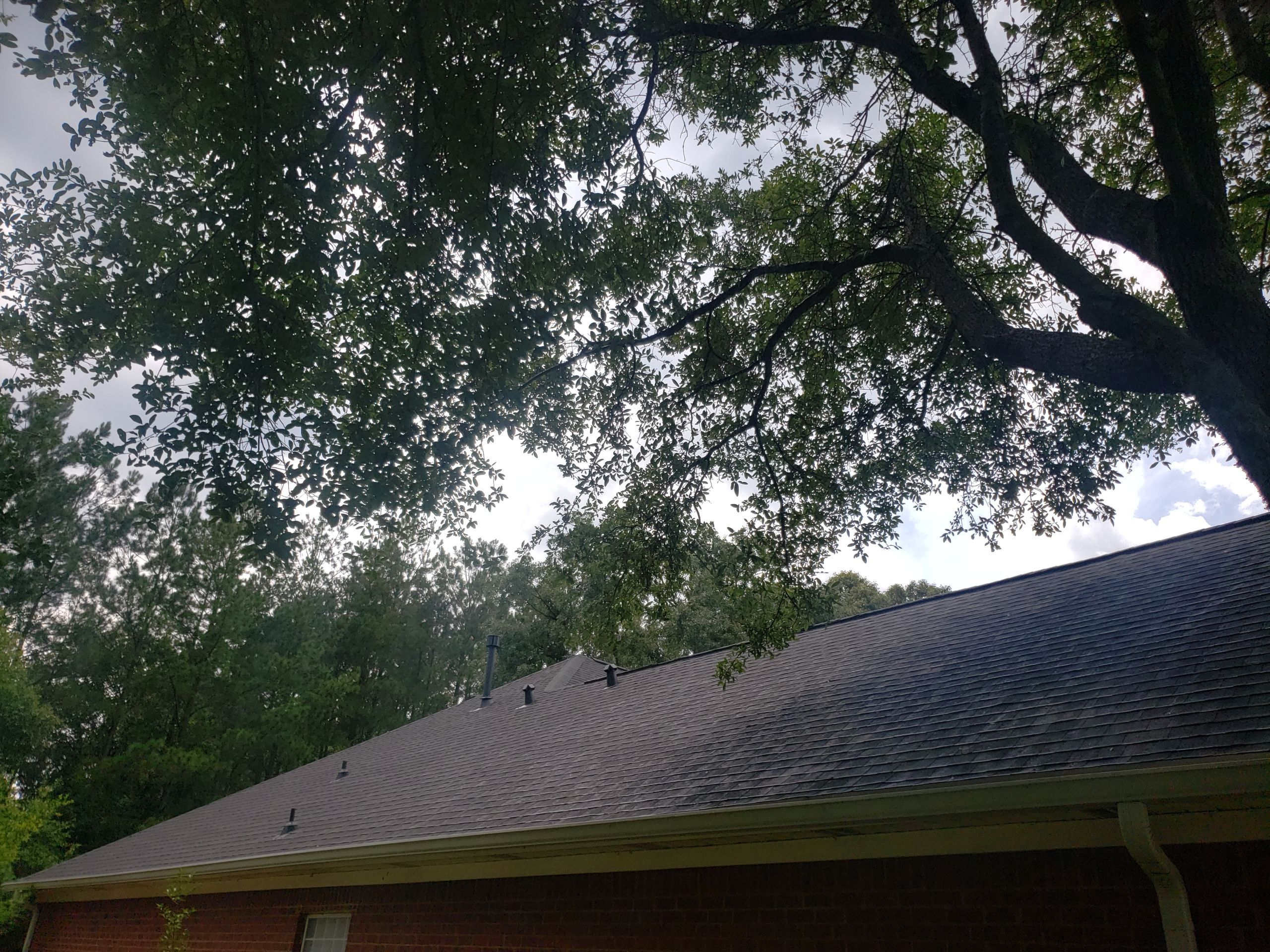 Residential Roofing Installation using Roof Replacement by American Roofing & Construction LLC