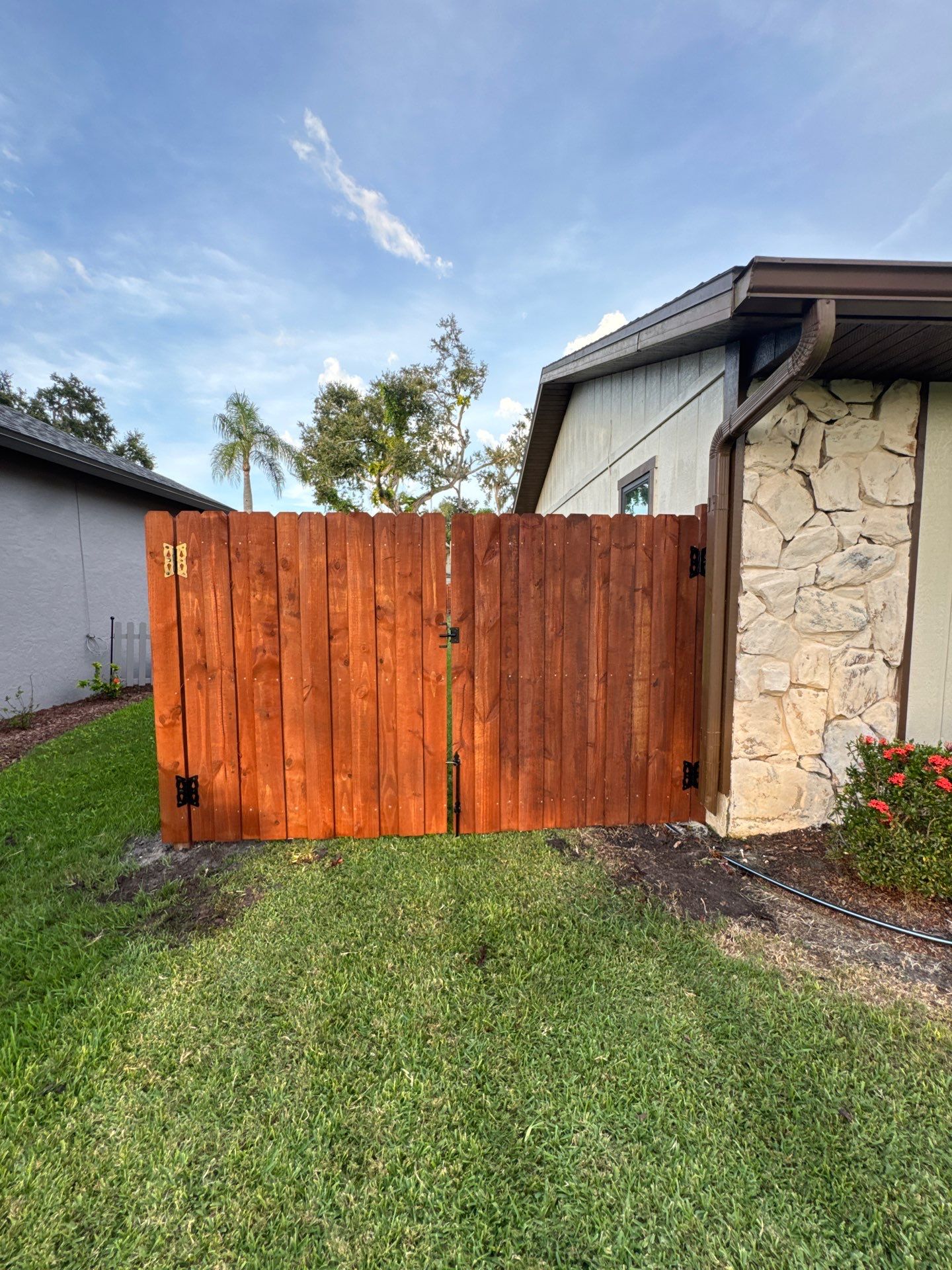 Wood Fence Installation using Pre-stained Pine Board On Board by Asap fence and gates, LLC