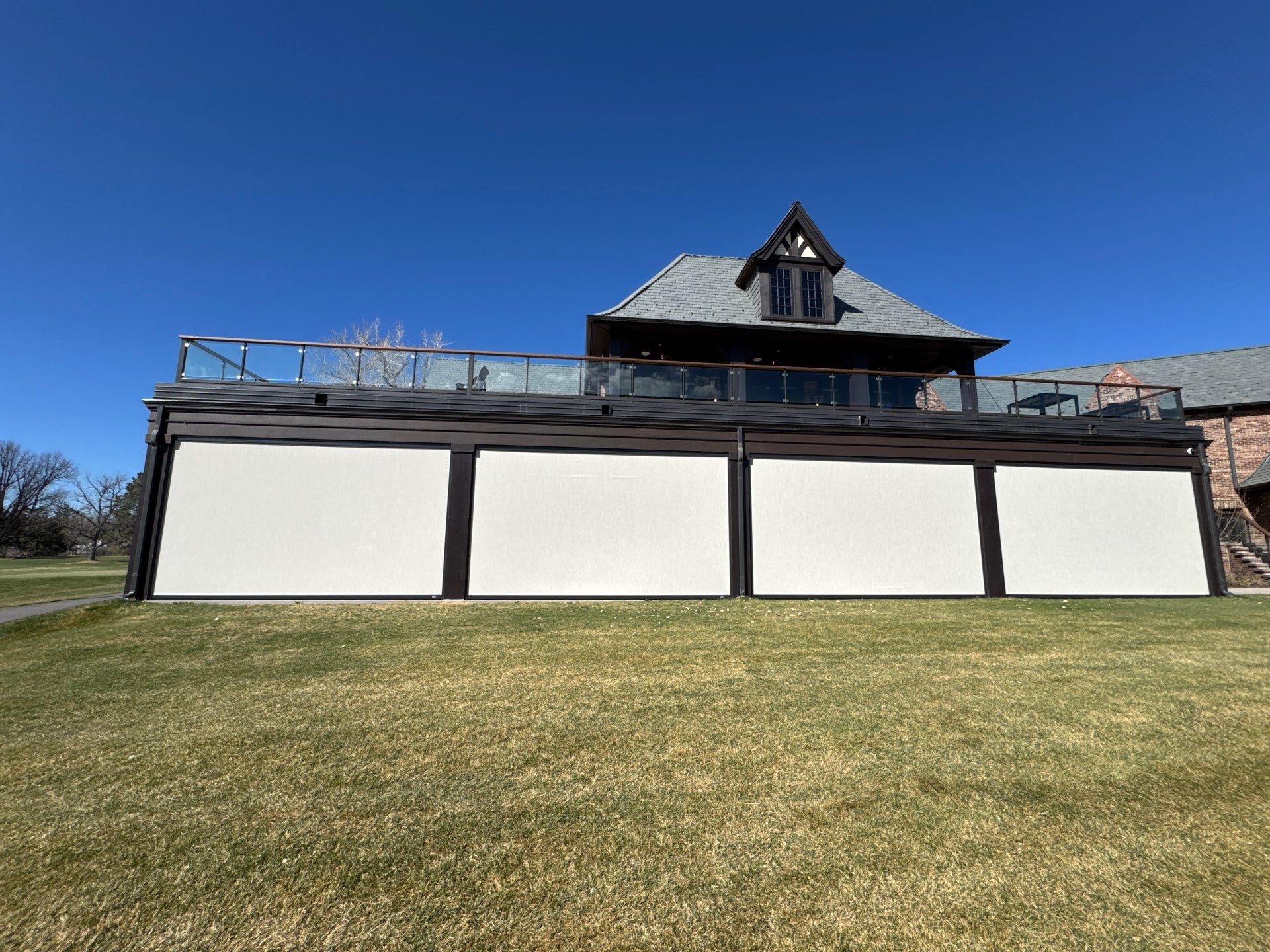 Motorized Screens using Progressive MagnaTrack Screens by Outdoor Solutions Colorado
