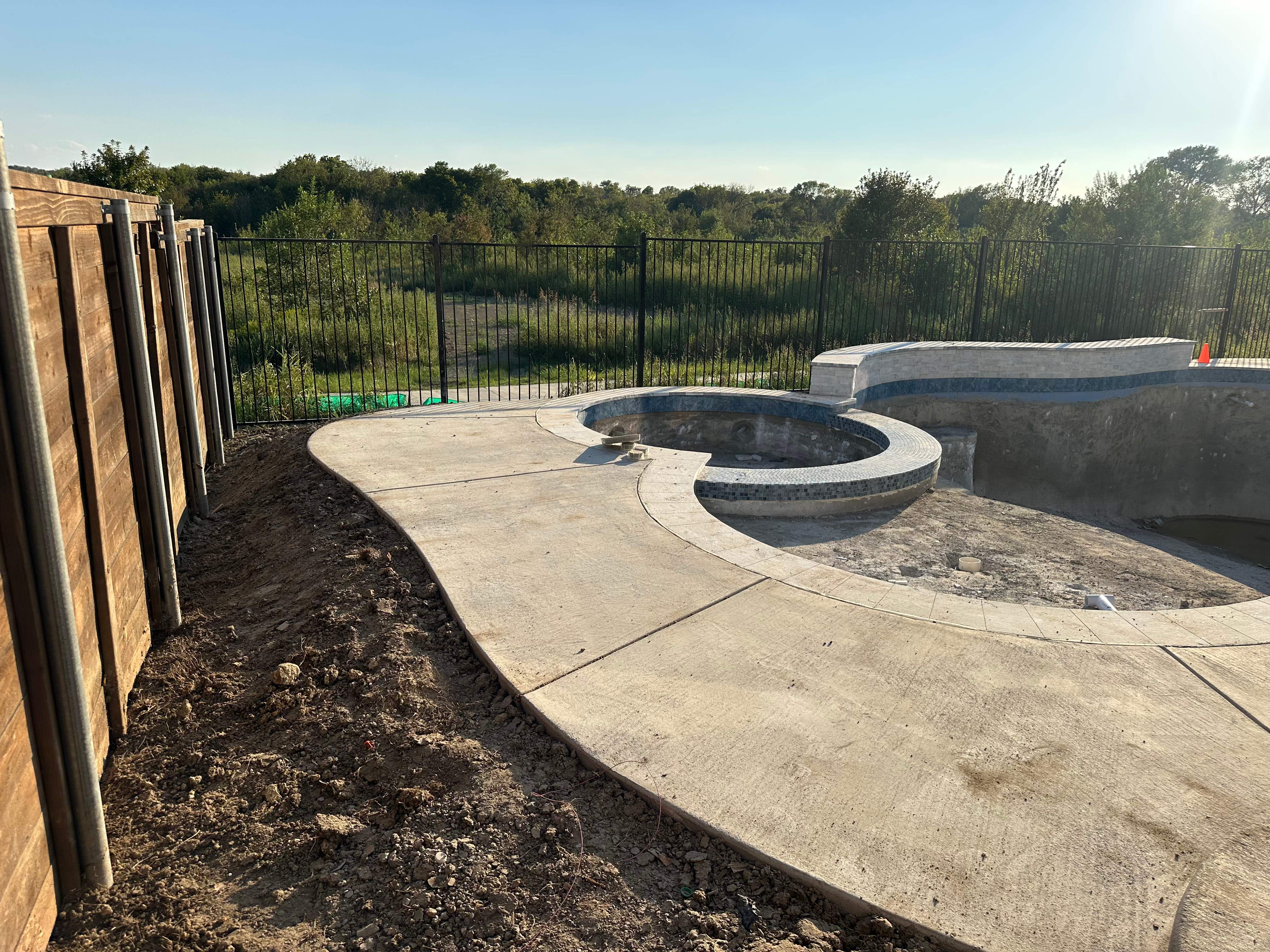 Freeform Pool with Raised Spa and Tanning Ledge by Pinnacle Pools and Spas - DFW